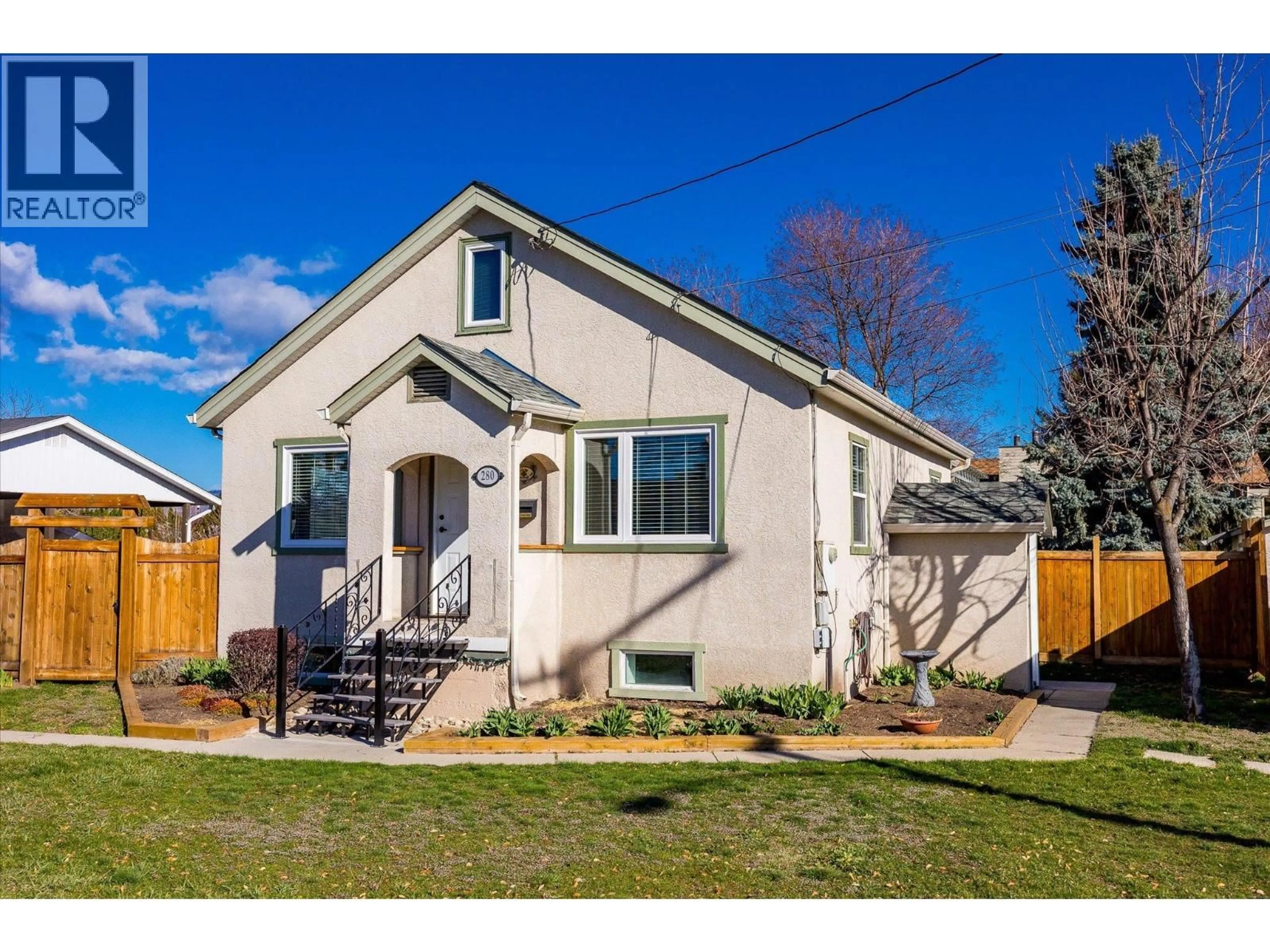 Home with vinyl exterior material, street for 280 MUGFORD ROAD, Kelowna British Columbia V1X2E2