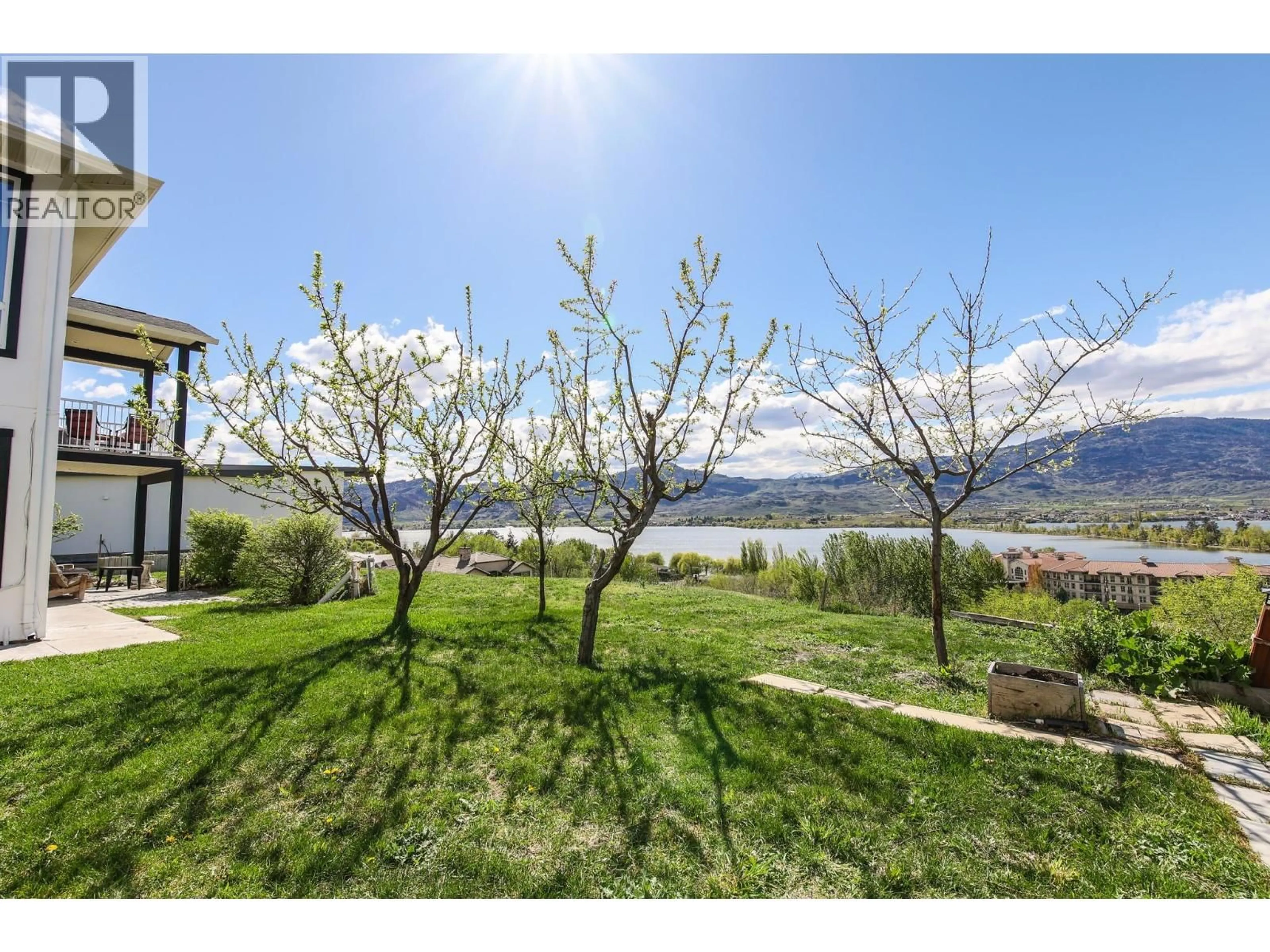 A pic from outside/outdoor area/front of a property/back of a property/a pic from drone, water/lake/river/ocean view for 4004 39TH STREET, Osoyoos British Columbia V0H1V6