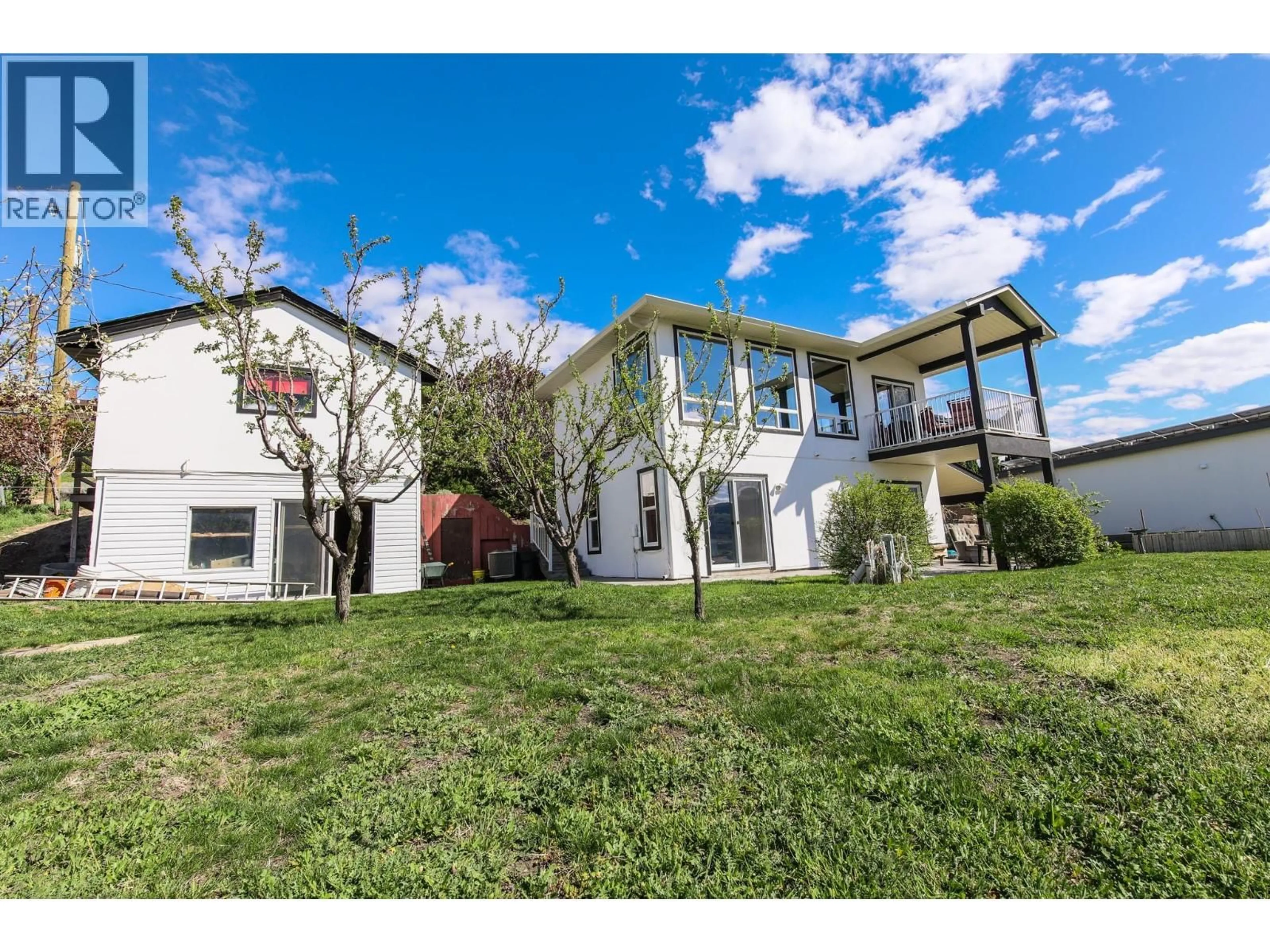 A pic from outside/outdoor area/front of a property/back of a property/a pic from drone, street for 4004 39TH STREET, Osoyoos British Columbia V0H1V6