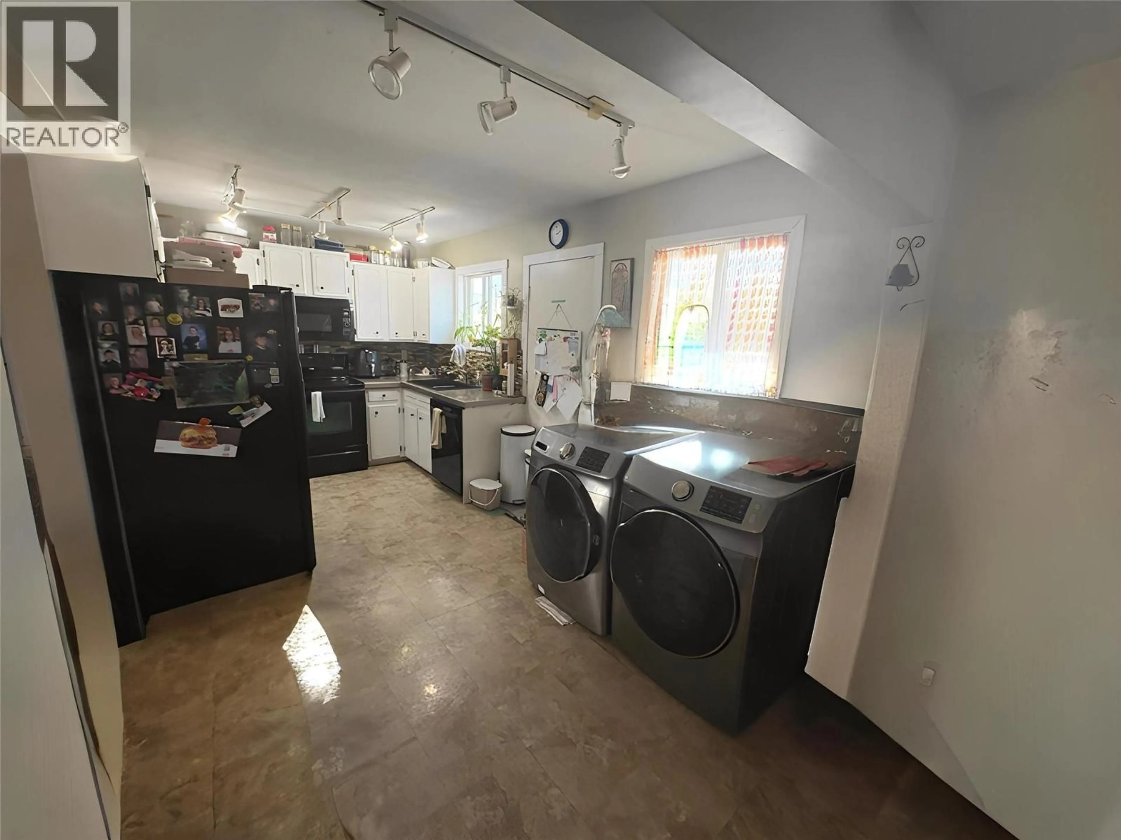 Kitchen with laundary machines, floor is not visible for 2270 GREENFIELD AVENUE, Kamloops British Columbia V2B4P3