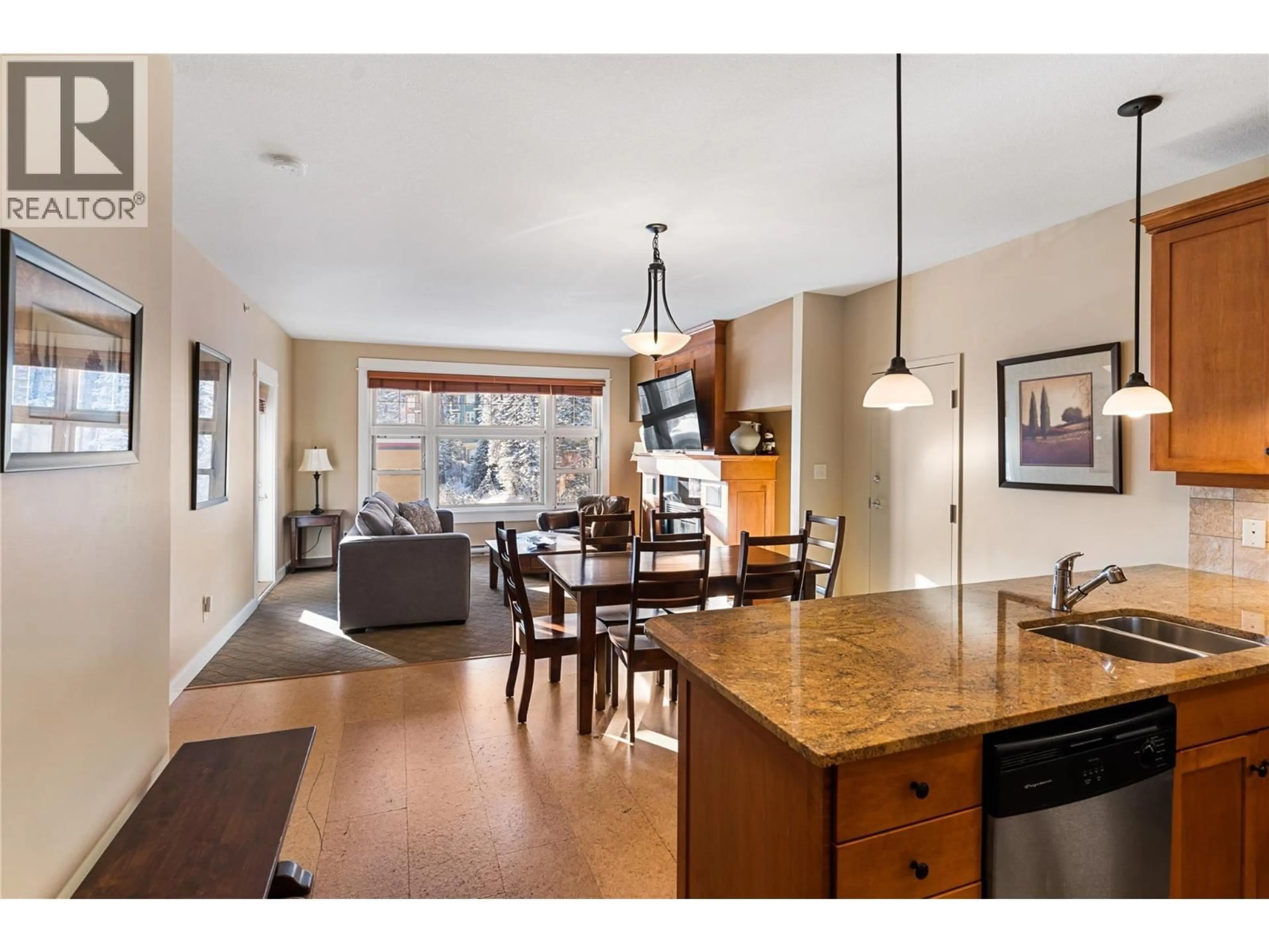 Open concept kitchen, wood/laminate floor for 510 - 170 SILVER LODE LANE, Silver Star British Columbia V1B3M1