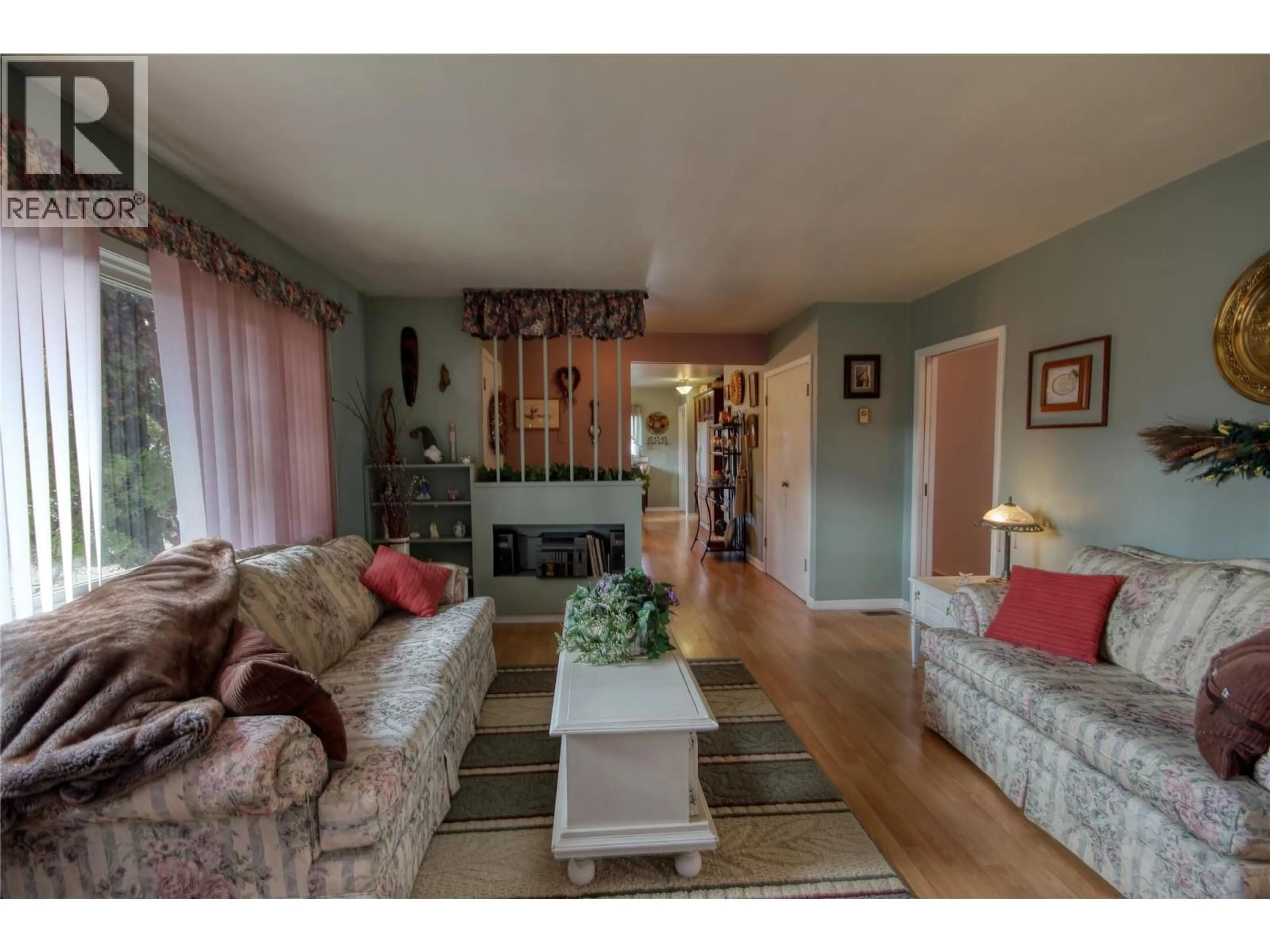 Living room with furniture, wood/laminate floor for 4771 BURNS AVENUE, Canal Flats British Columbia V0B1B0