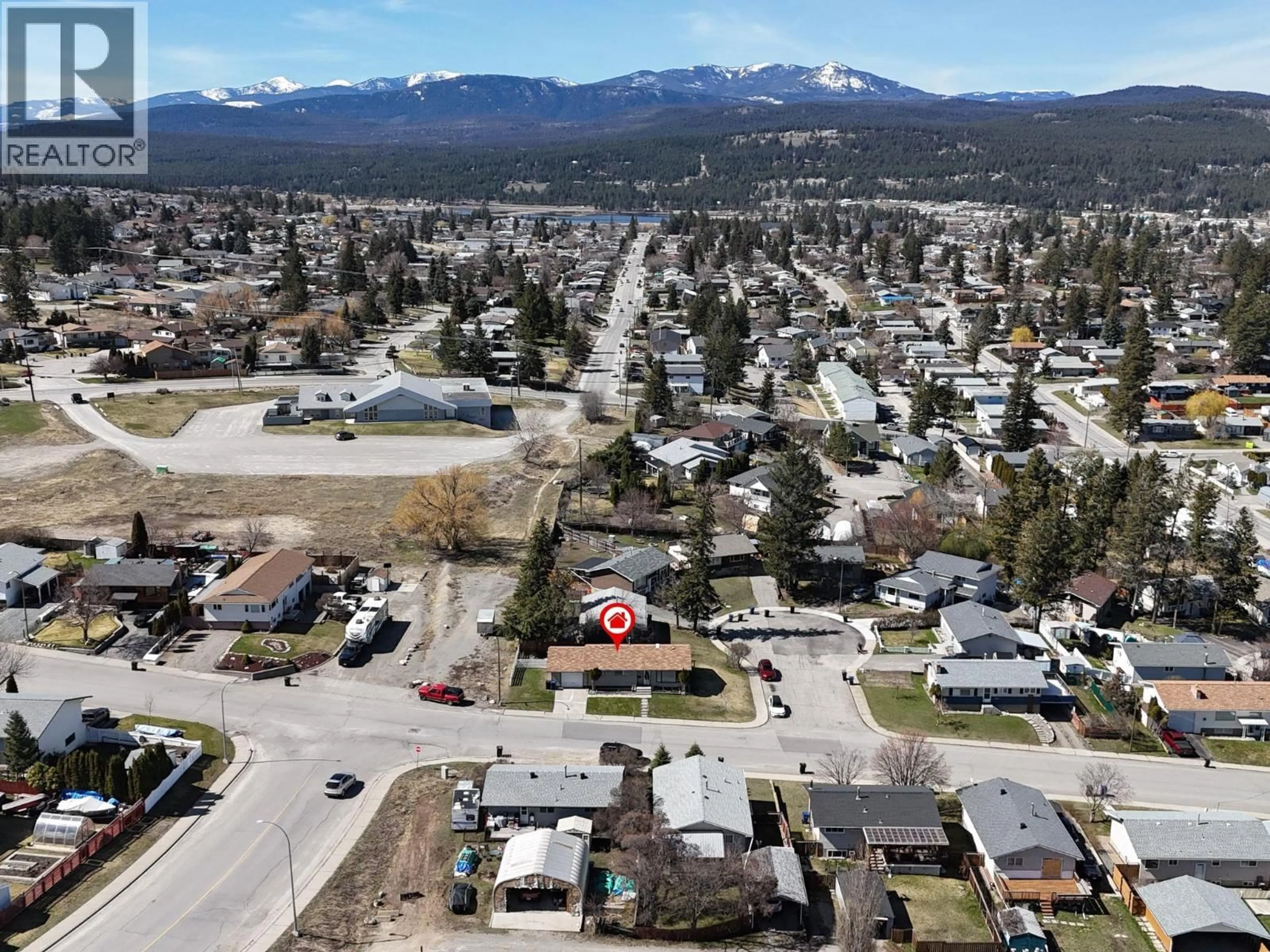 A pic from outside/outdoor area/front of a property/back of a property/a pic from drone, mountain view for 1061 16TH AVENUE SOUTH, Cranbrook British Columbia V1C3A3