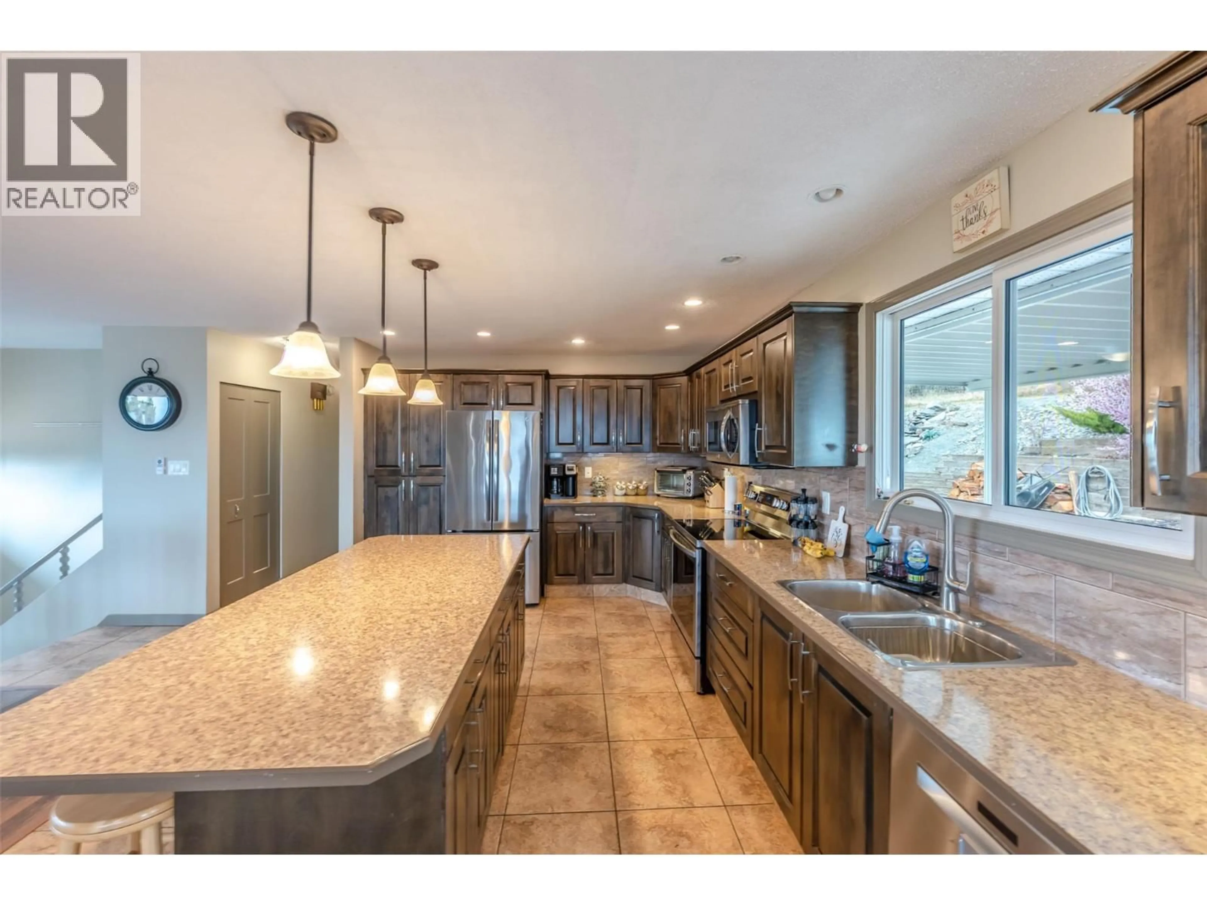 Open concept kitchen, ceramic/tile floor for 1418 FAIRVIEW ROAD, Oliver British Columbia V0H1T5