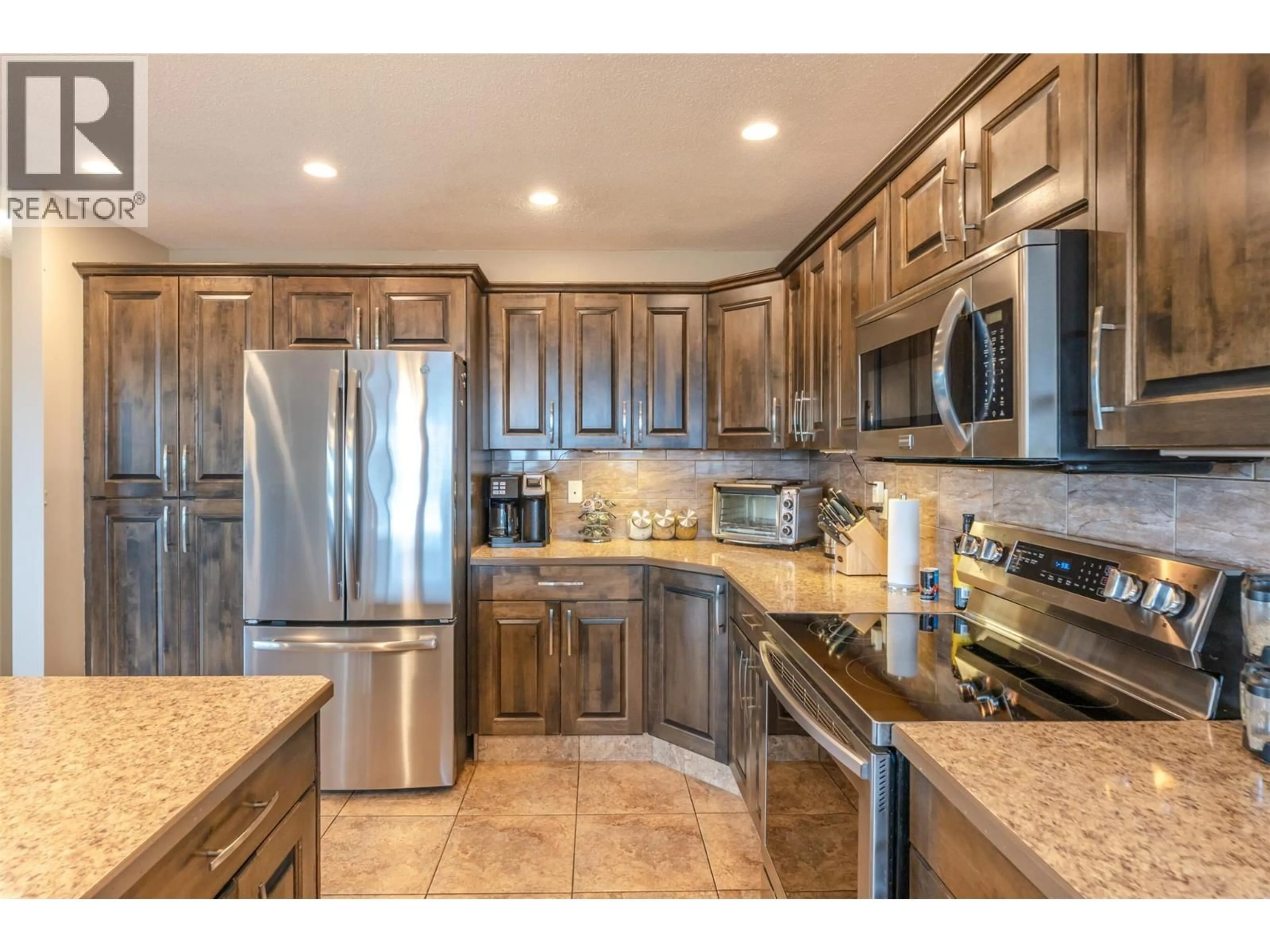 Open concept kitchen, ceramic/tile floor for 1418 FAIRVIEW ROAD, Oliver British Columbia V0H1T5