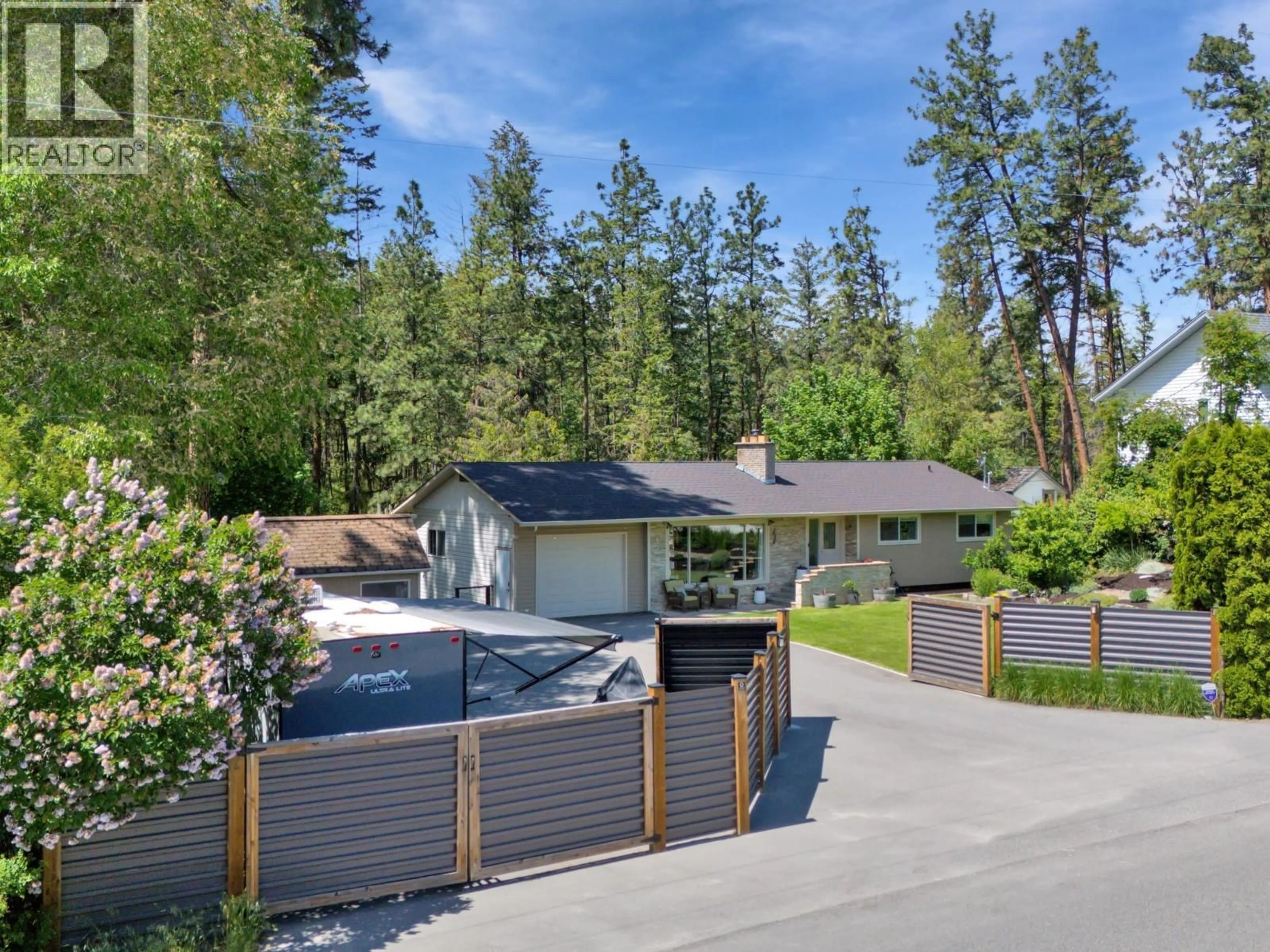 A pic from outside/outdoor area/front of a property/back of a property/a pic from drone, unknown for 1766 GARNER ROAD, Kelowna British Columbia V1P1E5