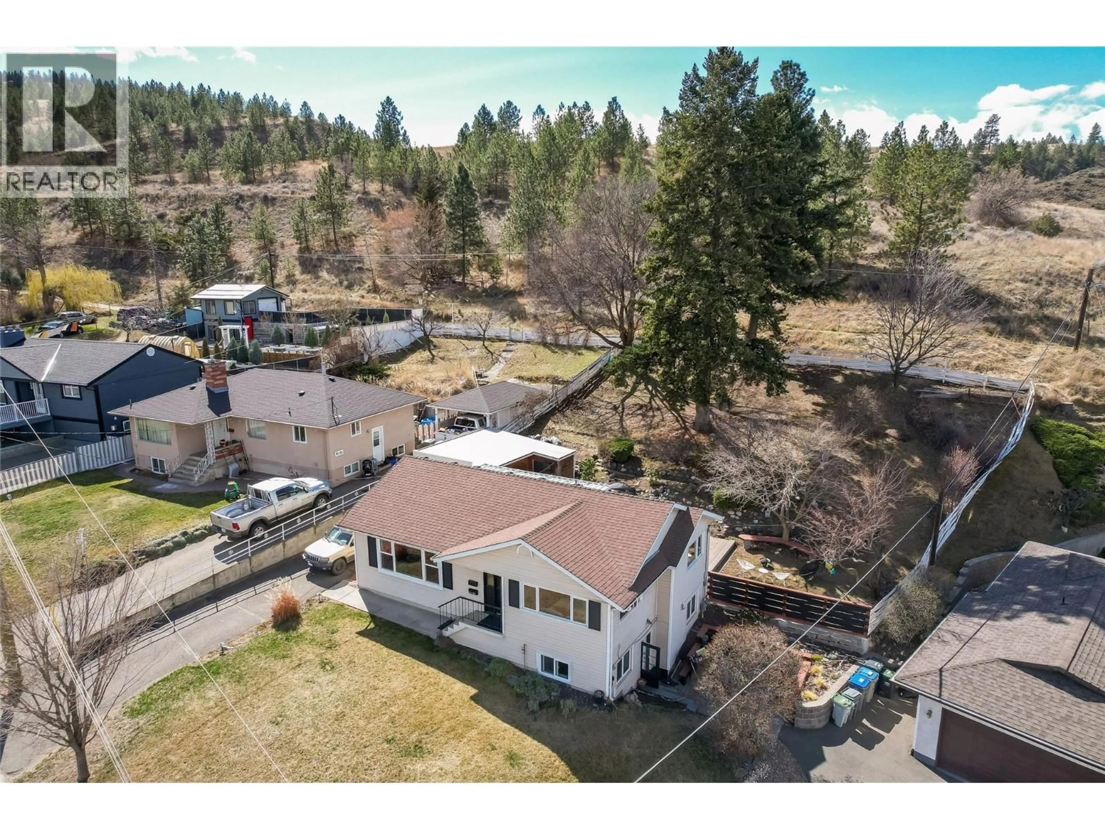 A pic from outside/outdoor area/front of a property/back of a property/a pic from drone, unknown for 593 TUNSTALL CRESCENT, Kamloops British Columbia V2C3J1