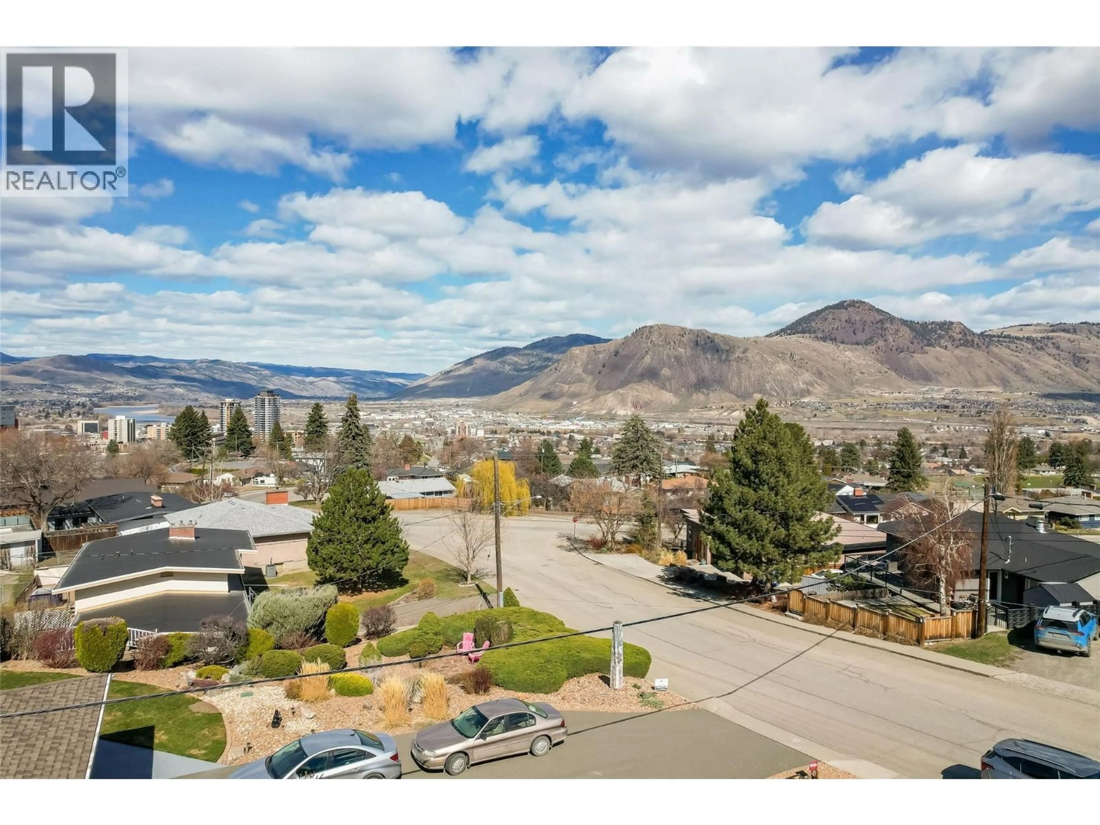 A pic from outside/outdoor area/front of a property/back of a property/a pic from drone, mountain view for 593 TUNSTALL CRESCENT, Kamloops British Columbia V2C3J1