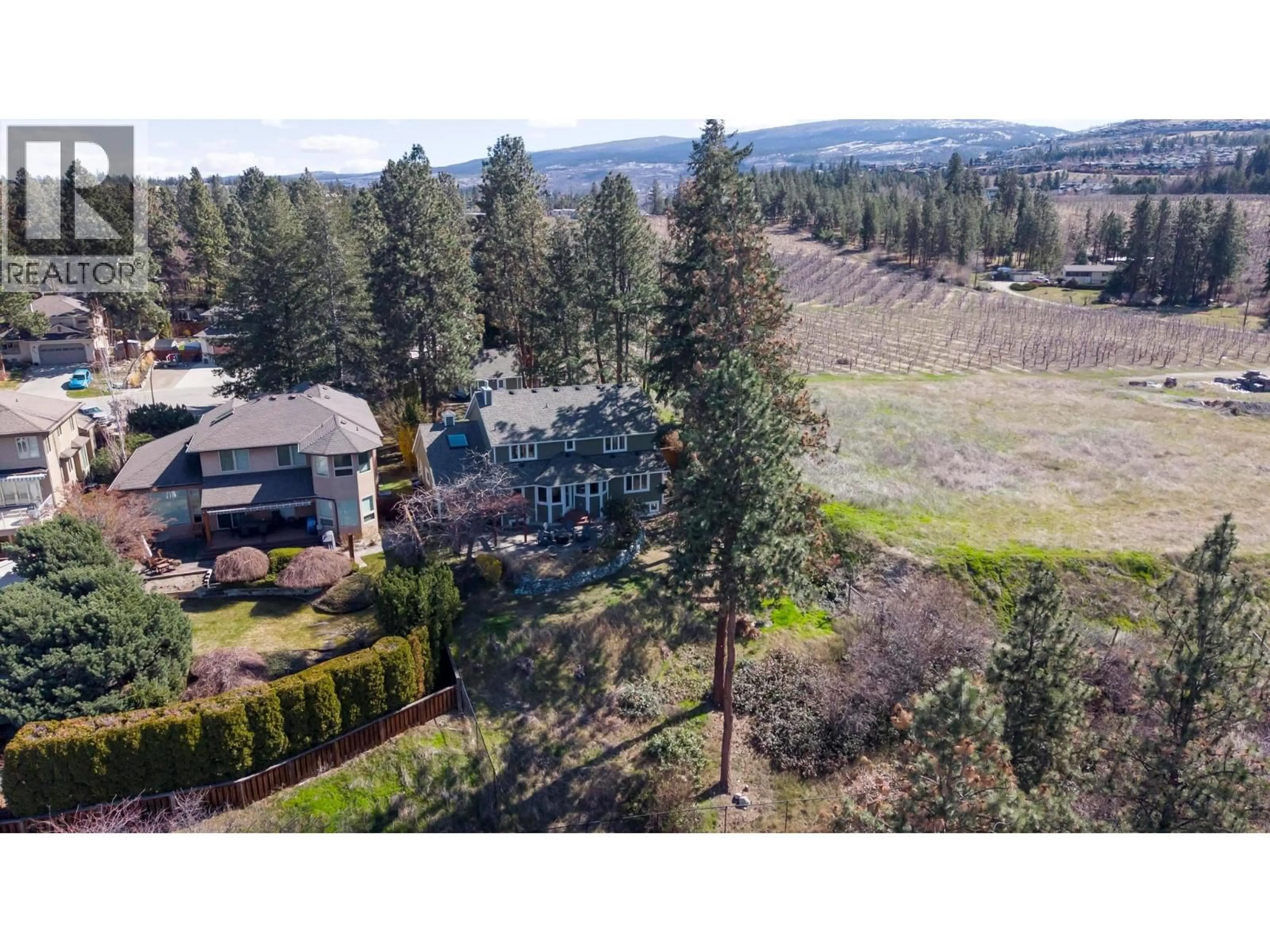 A pic from outside/outdoor area/front of a property/back of a property/a pic from drone, unknown for 486 BAYHILL PLACE, Kelowna British Columbia V1W2Z8