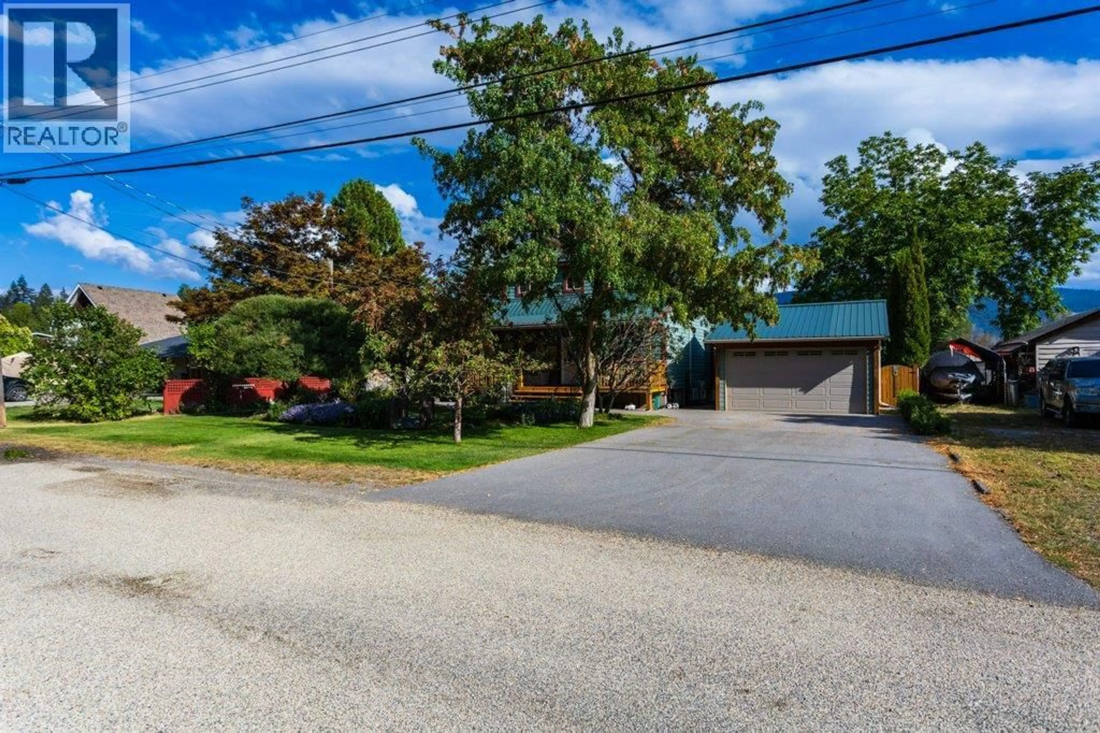 A pic from outside/outdoor area/front of a property/back of a property/a pic from drone, street for 7331 FINTRY DELTA ROAD, Kelowna British Columbia V1Z3V2