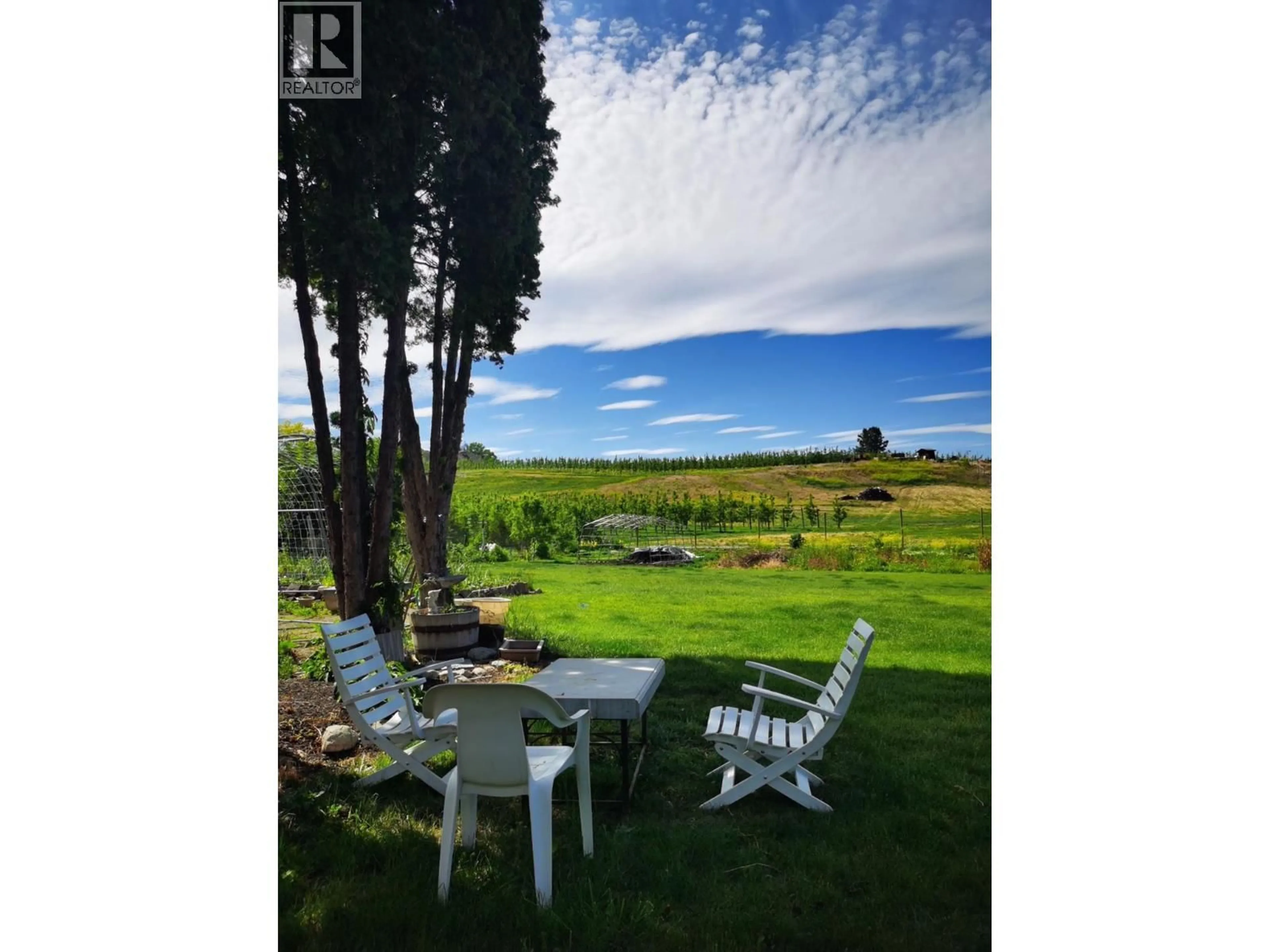 A pic from outside/outdoor area/front of a property/back of a property/a pic from drone, water/lake/river/ocean view for 2662 LONGHILL ROAD, Kelowna British Columbia V1V2G5
