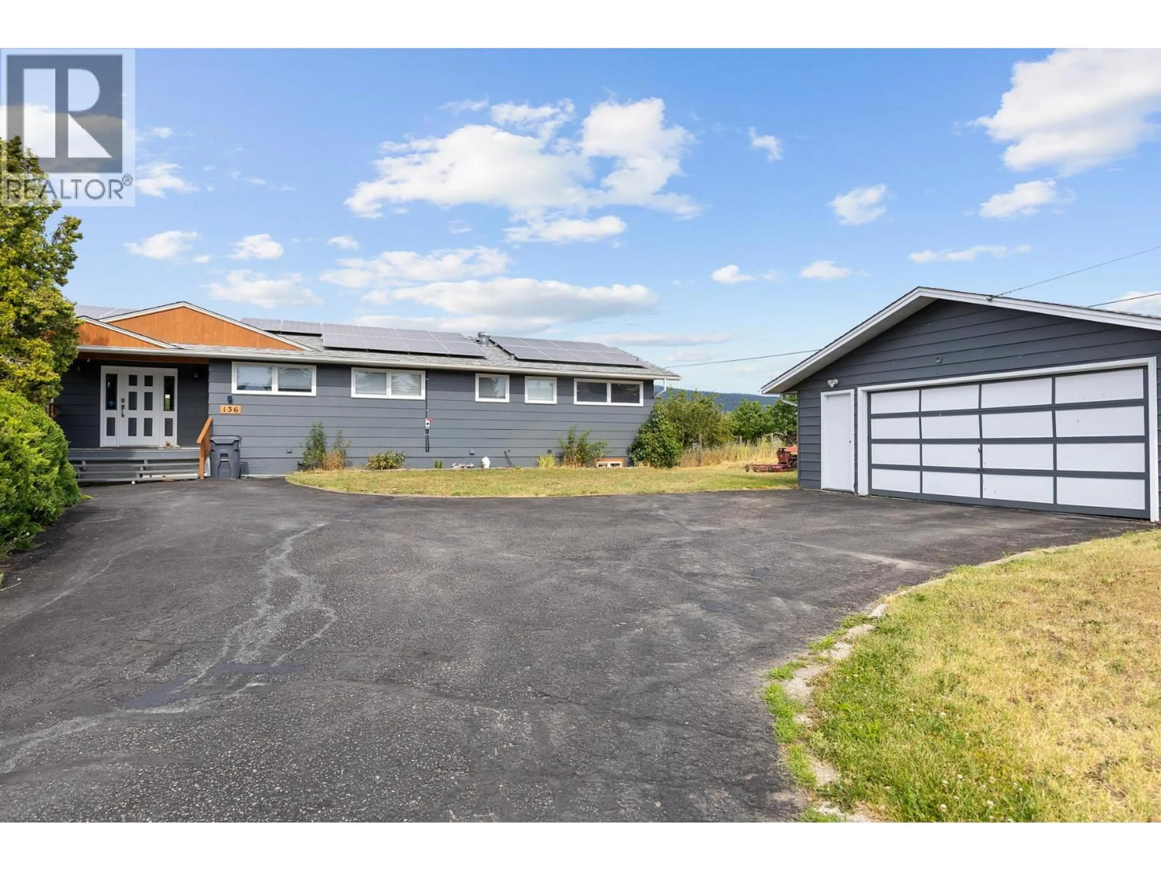 A pic from outside/outdoor area/front of a property/back of a property/a pic from drone, street for 136 STEPPING STONES CRESCENT, Spallumcheen British Columbia V1H1X2