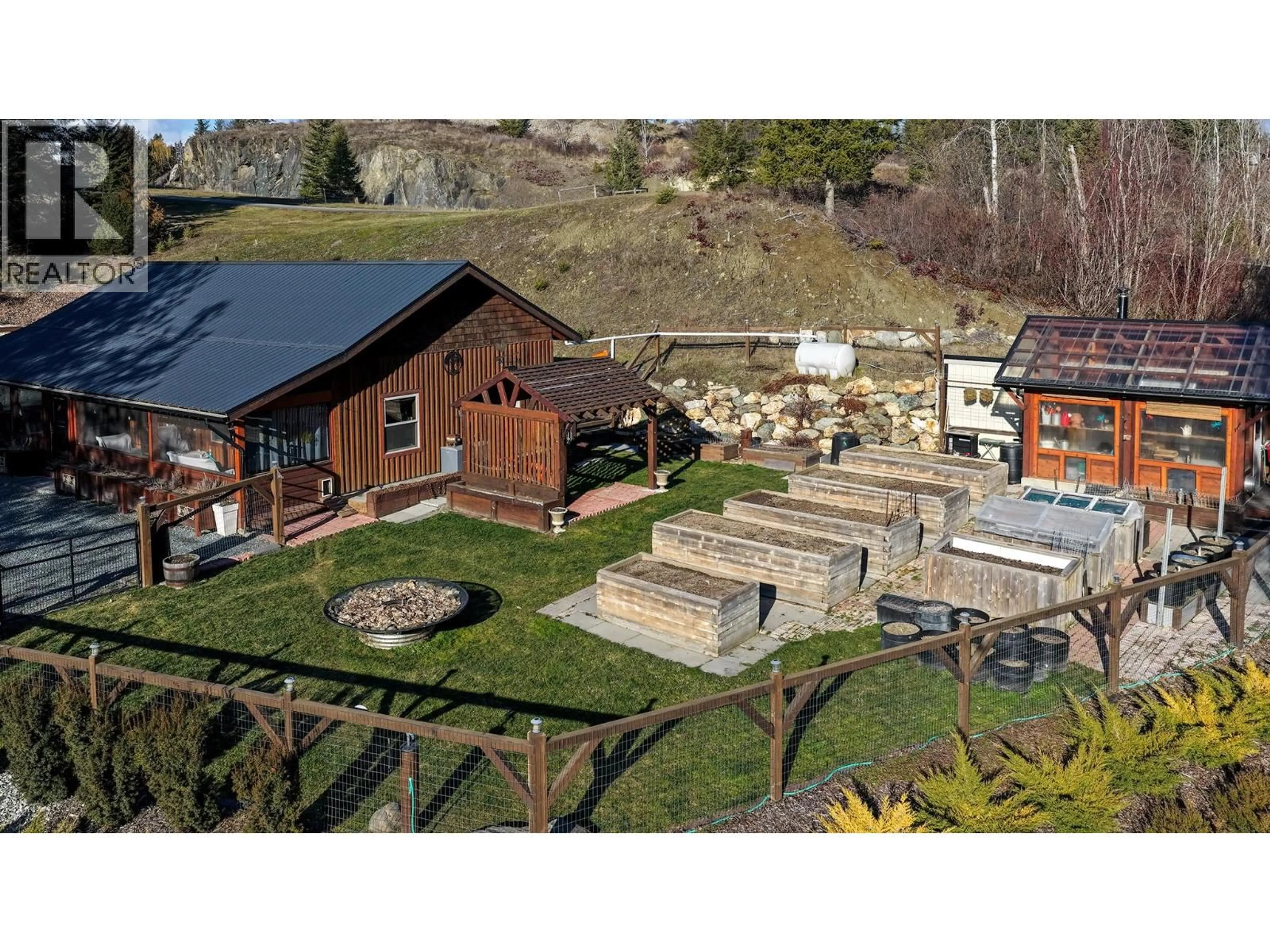 A pic from outside/outdoor area/front of a property/back of a property/a pic from drone, mountain view for 1627 HOOD ROAD ROAD, Creston British Columbia V0B1G2