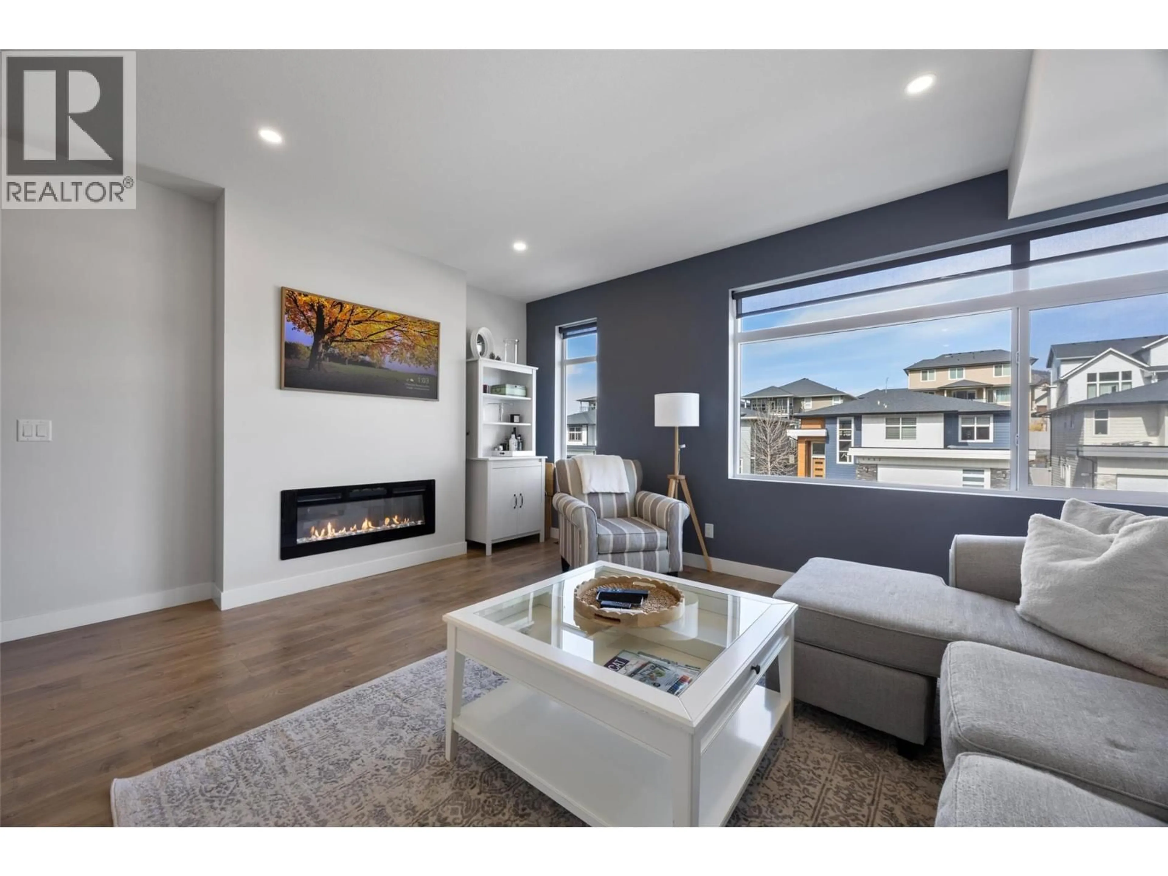 Living room with furniture, wood/laminate floor for 110 - 1901 QU'APPELLE BOULEVARD, Kamloops British Columbia V2E0C9