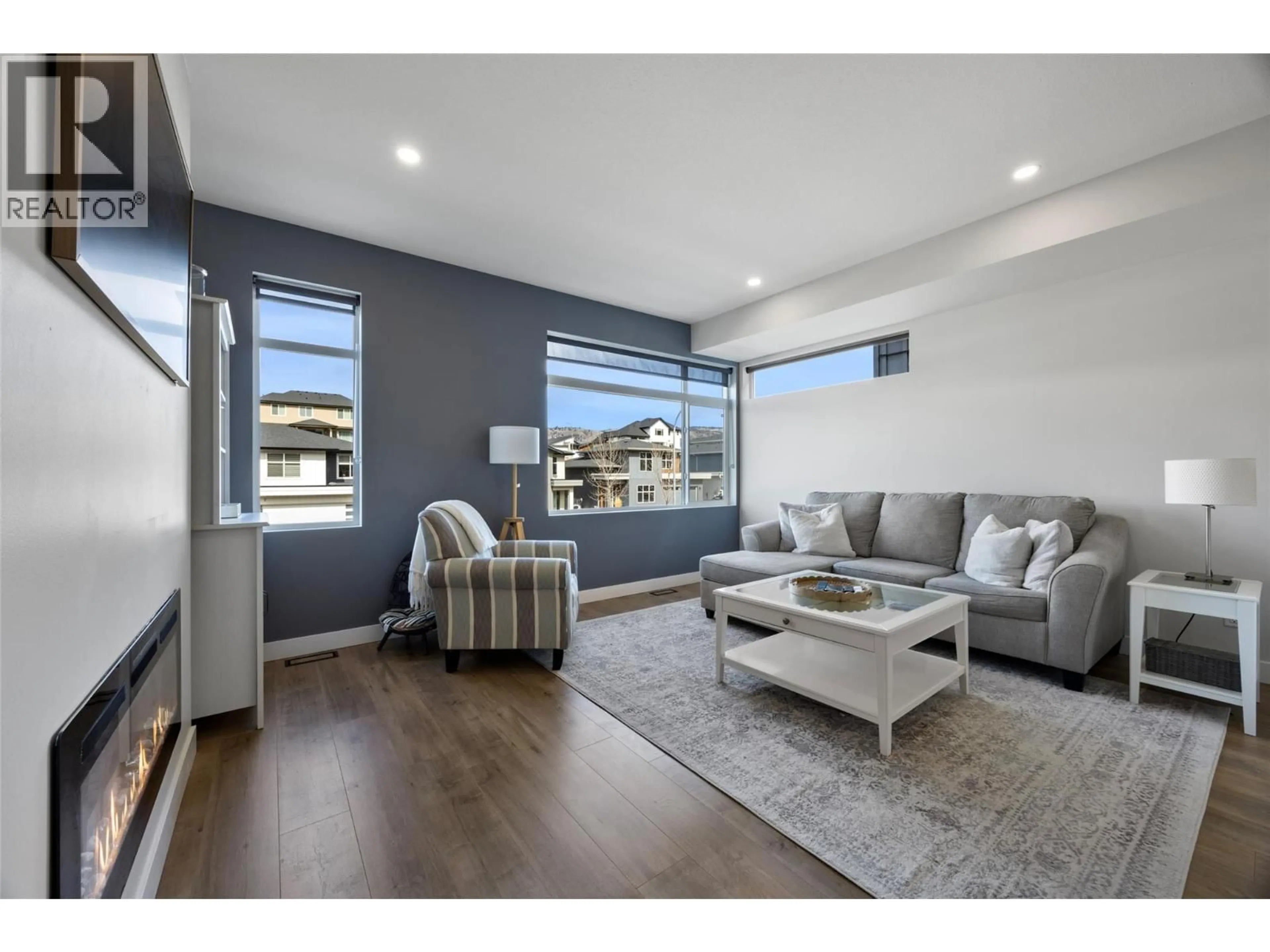 Living room with furniture, wood/laminate floor for 110 - 1901 QU'APPELLE BOULEVARD, Kamloops British Columbia V2E0C9