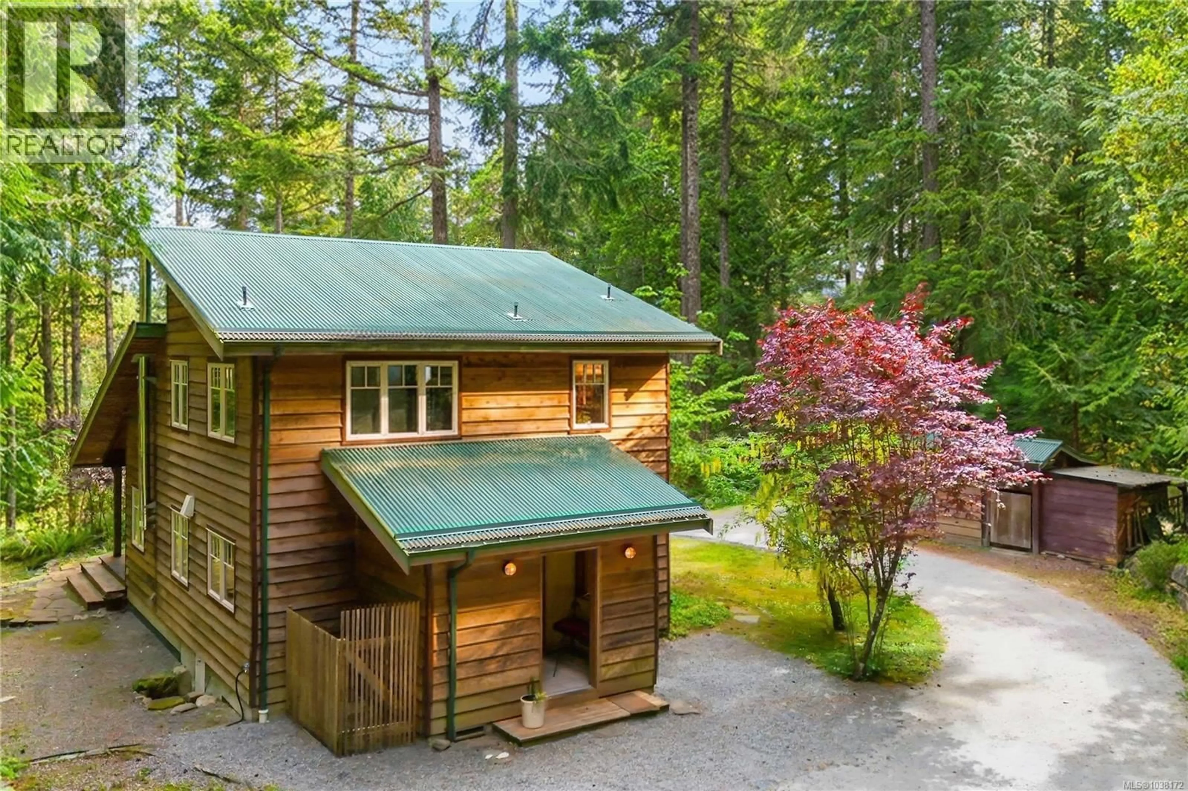 A pic from outside/outdoor area/front of a property/back of a property/a pic from drone, forest/trees view for 452 STARK ROAD, Salt Spring British Columbia V8K1P6