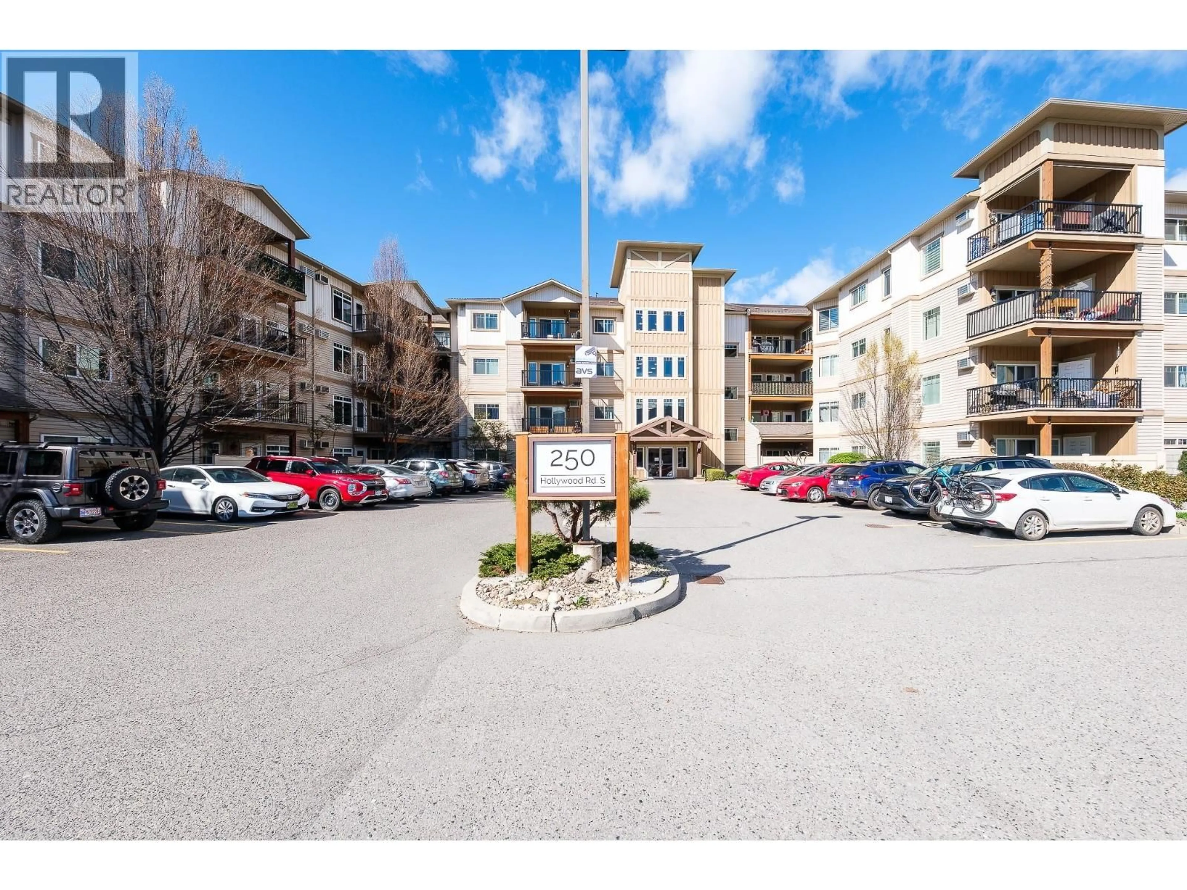 A pic from outside/outdoor area/front of a property/back of a property/a pic from drone, street for 311 - 250 HOLLYWOOD ROAD SOUTH, Kelowna British Columbia V1X3S9