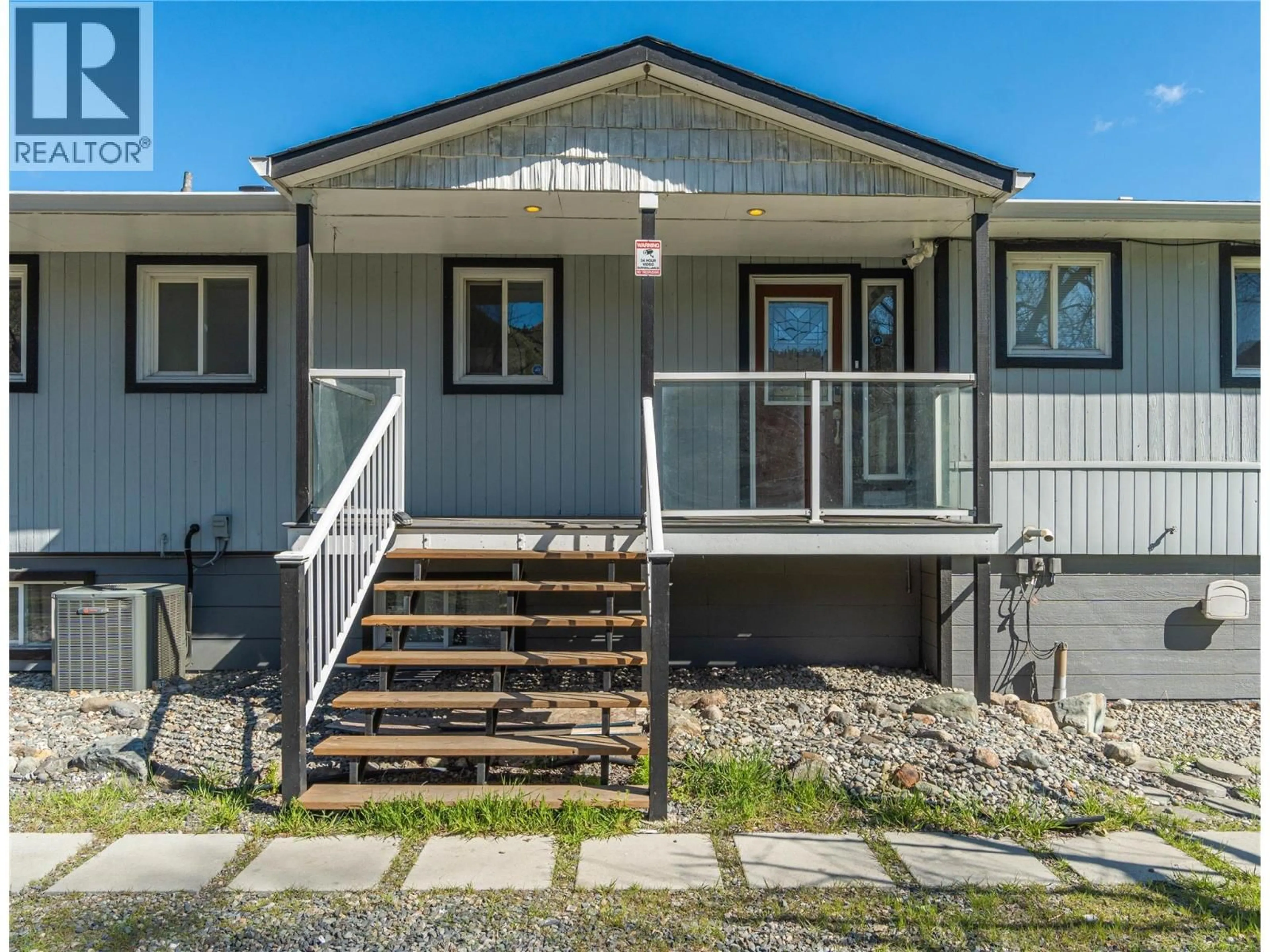 Home with vinyl exterior material, street for 7250 FURRER ROAD, Kamloops British Columbia V2C5T5