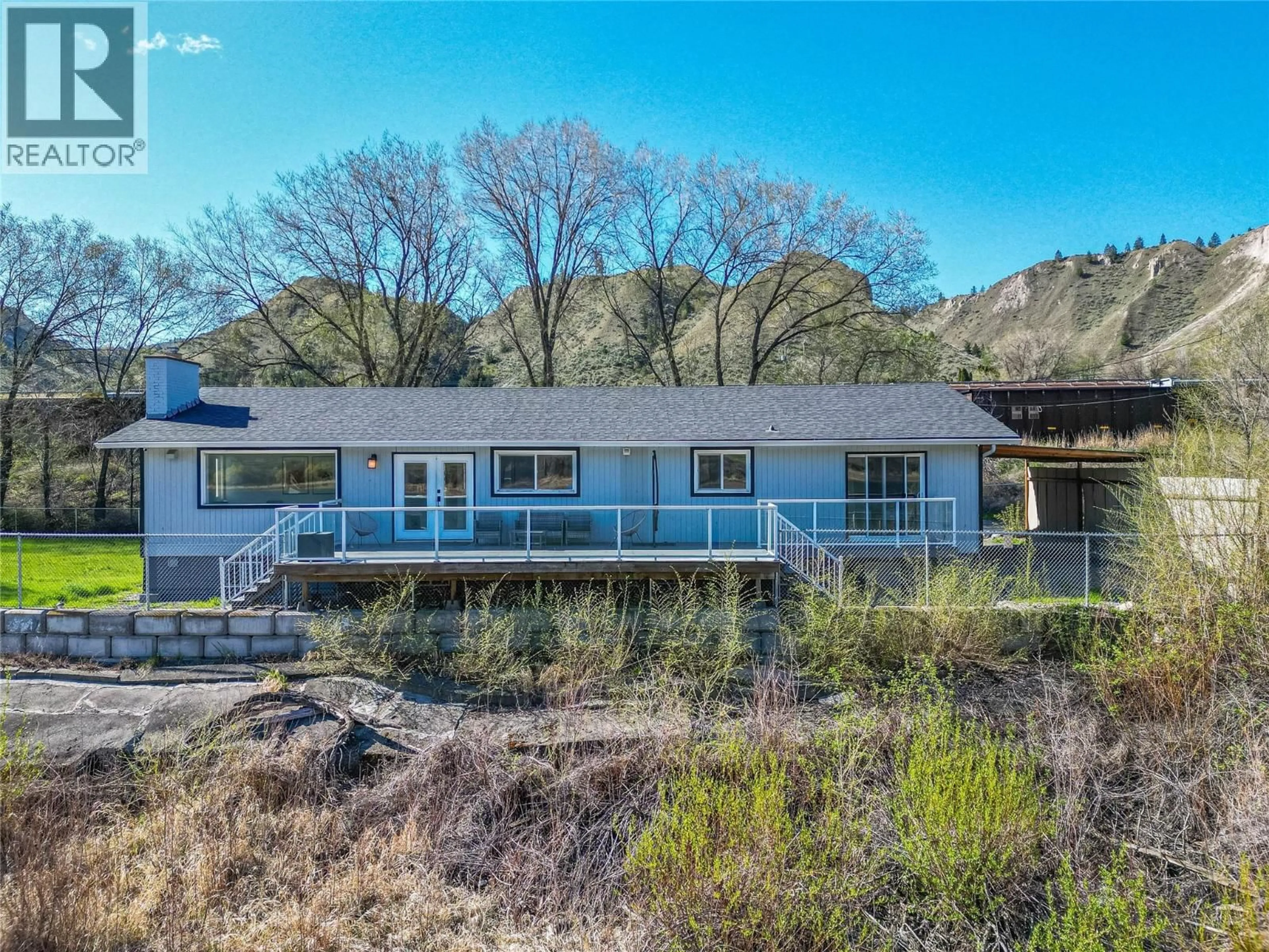 A pic from outside/outdoor area/front of a property/back of a property/a pic from drone, water/lake/river/ocean view for 7250 FURRER ROAD, Kamloops British Columbia V2C5T5