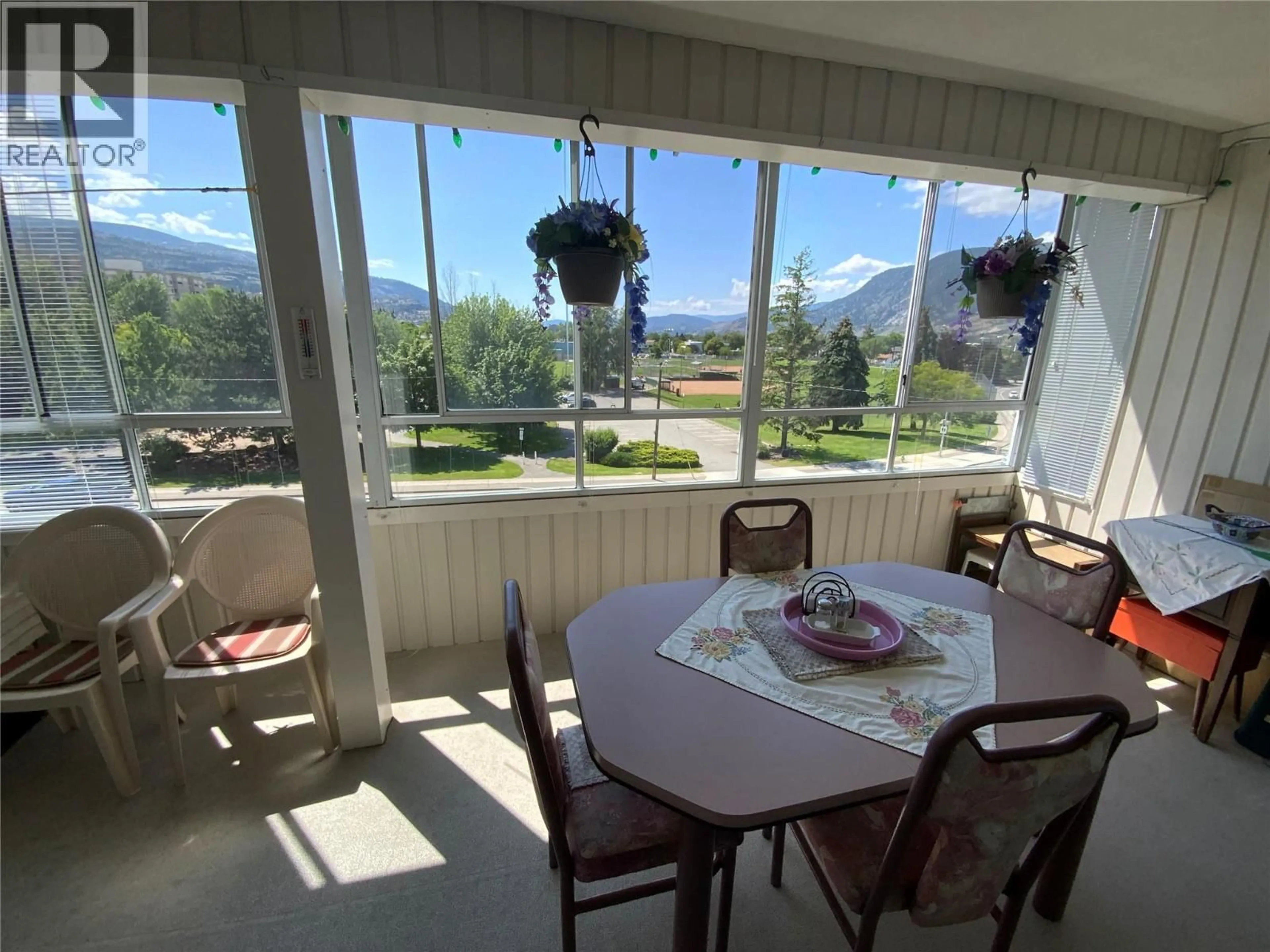 Balcony in the apartment, mountain view for 407 - 195 WARREN AVENUE, Penticton British Columbia V2A3N1