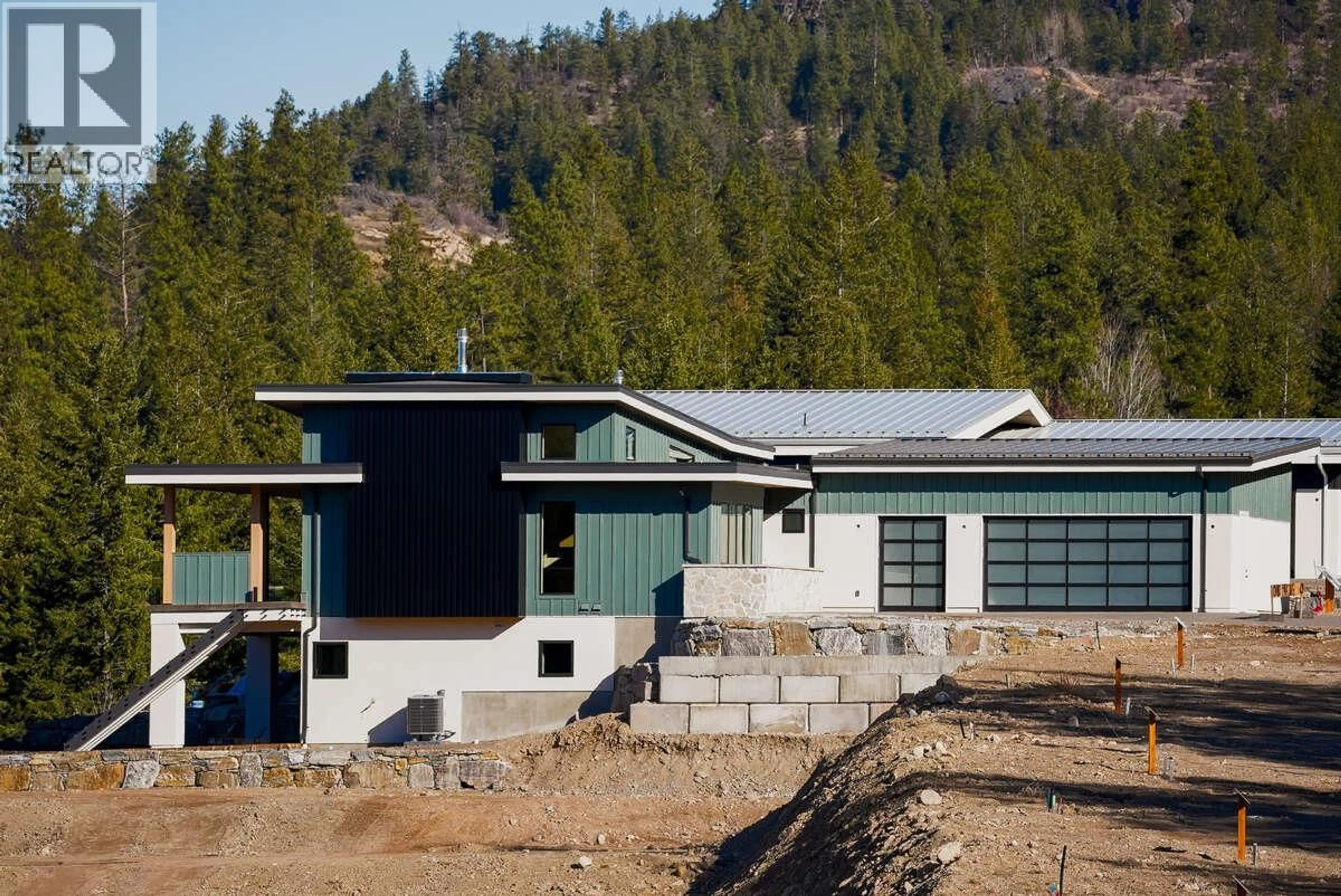 Home with vinyl exterior material, mountain view for 862 PREDATOR RIDGE DRIVE, Vernon British Columbia V1H1G4