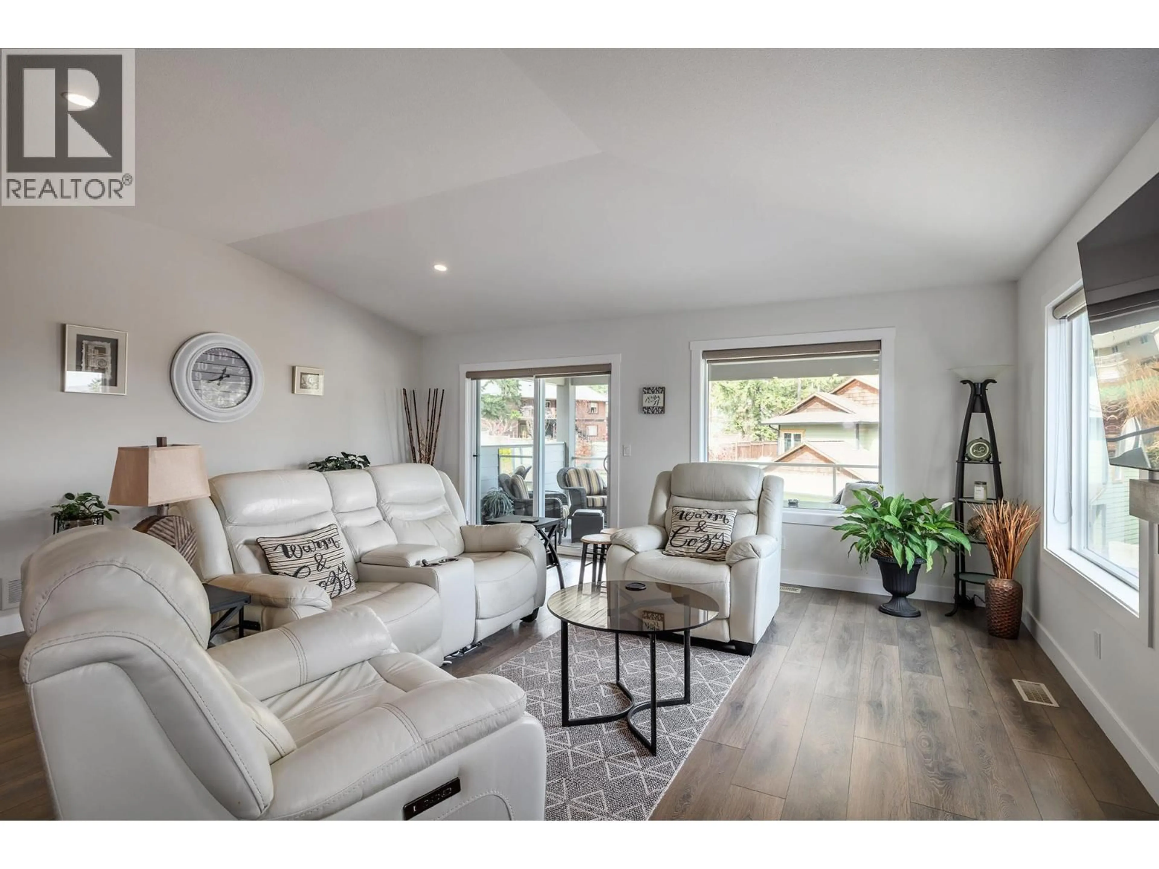 Living room with furniture, wood/laminate floor for 3042 GLENROSA ROAD, West Kelowna British Columbia V4T1C4