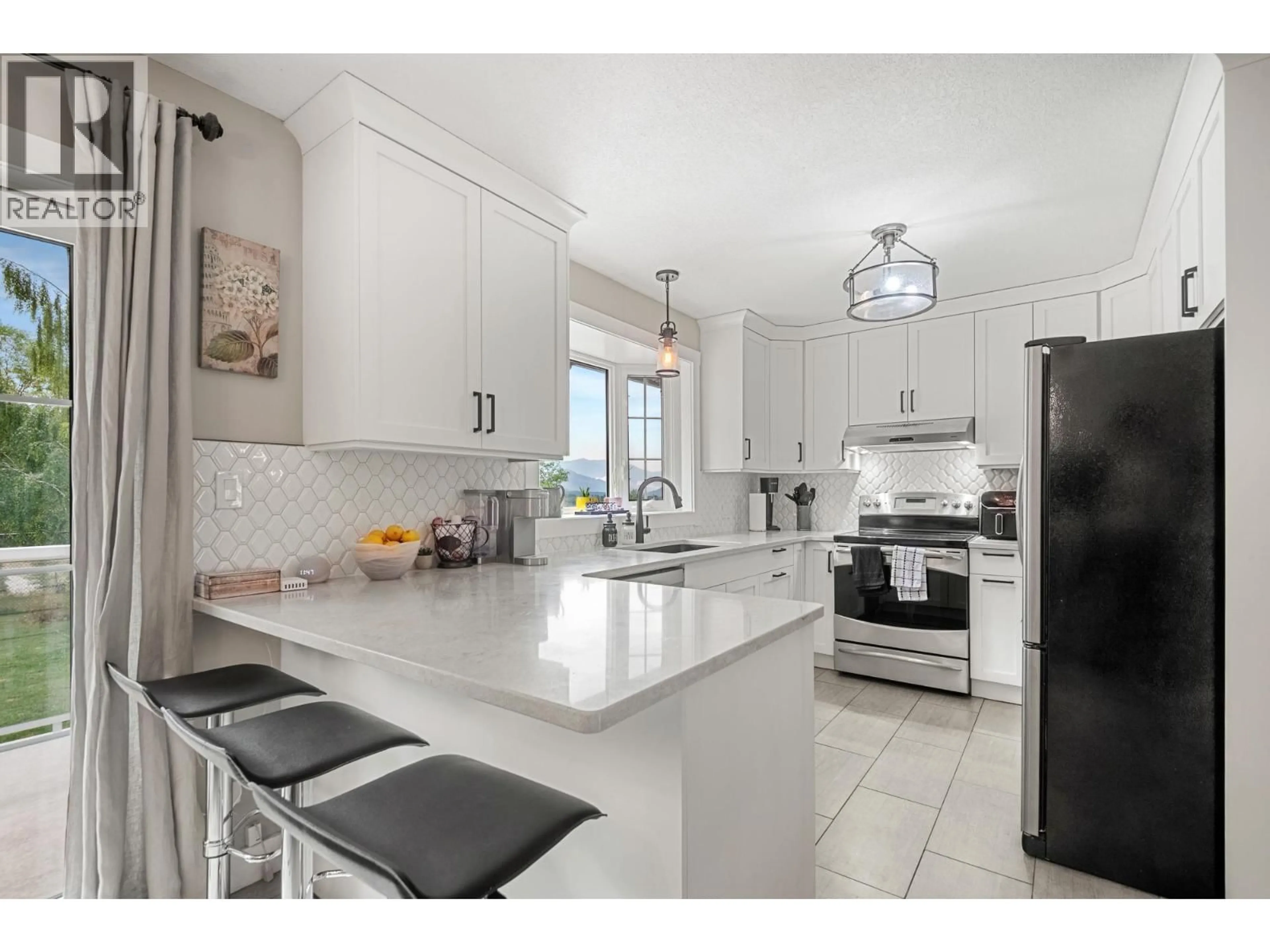 Open concept kitchen, ceramic/tile floor for 1257 VALLEY VIEW DRIVE, Sparwood British Columbia V0B2G2