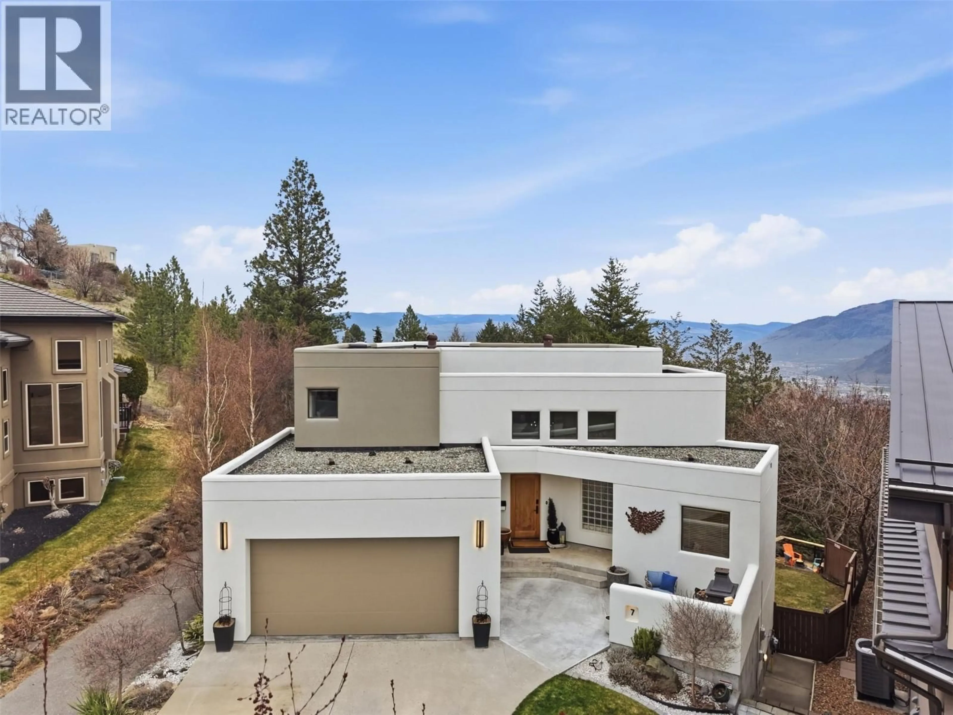 A pic from outside/outdoor area/front of a property/back of a property/a pic from drone, mountain view for 7 CHANCELLOR DRIVE, Kamloops British Columbia V2E2P1