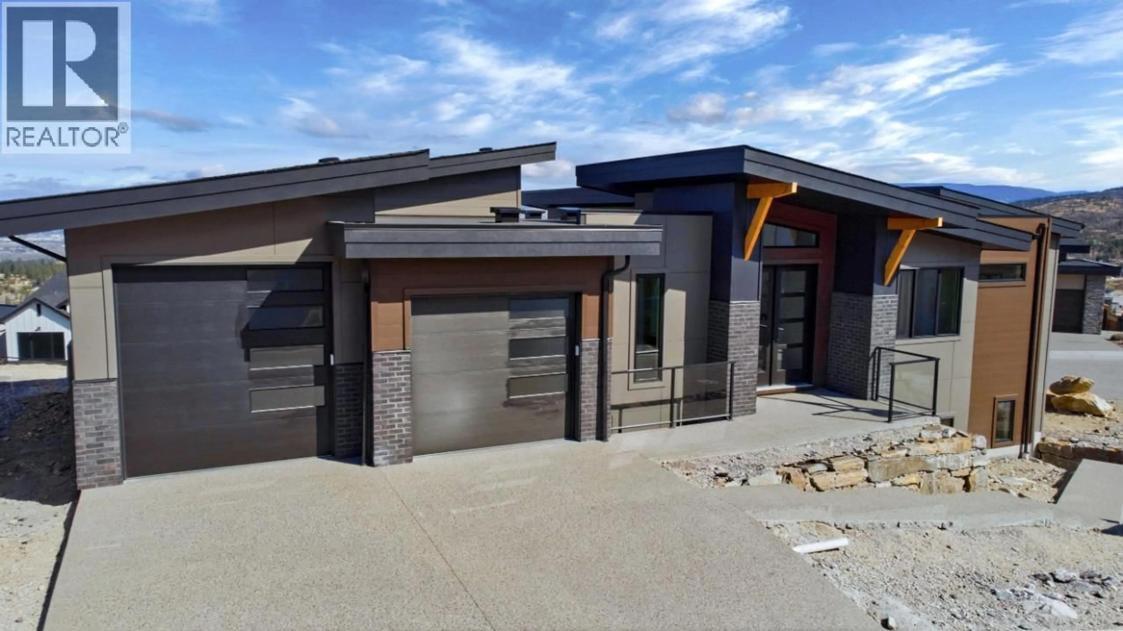 Home with brick exterior material, street for 1120 COLLINSON COURT, Kelowna British Columbia V1W0C3