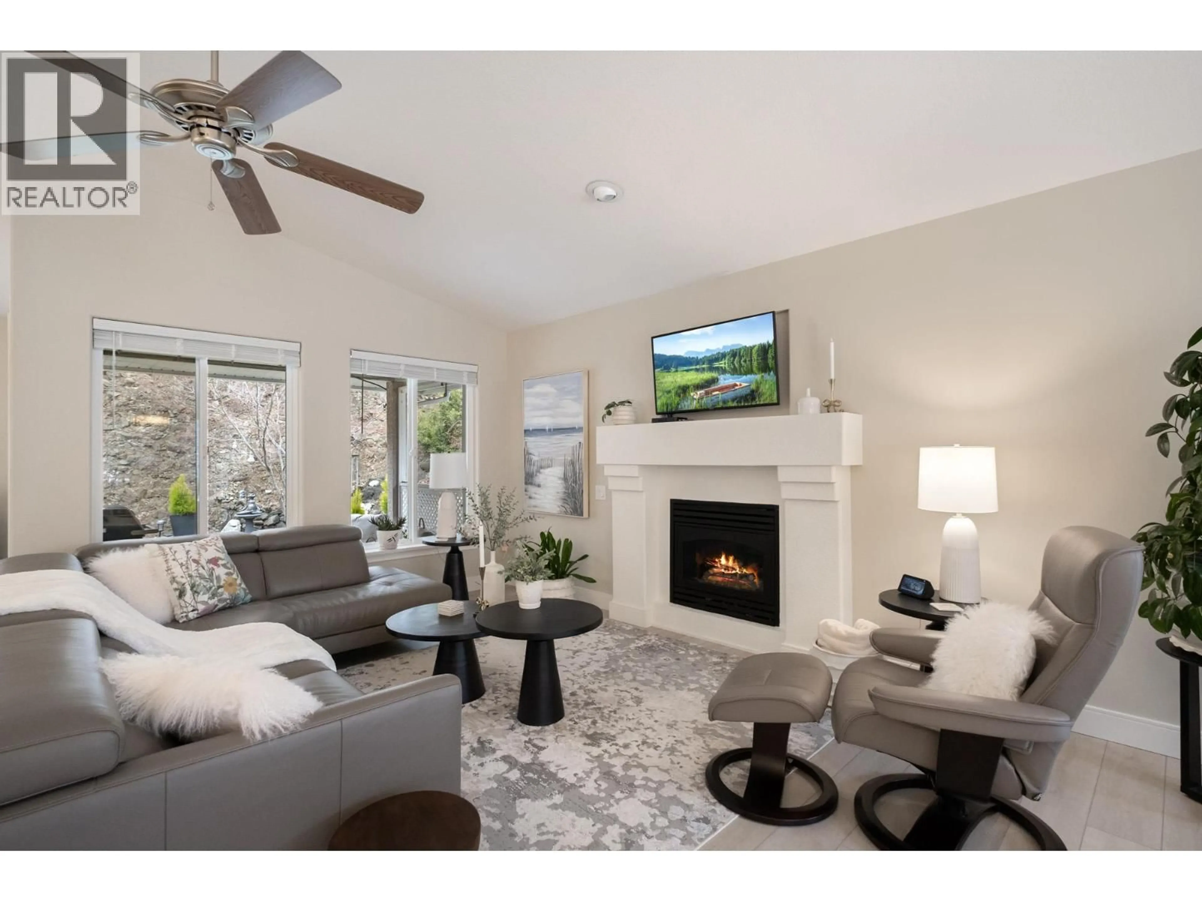 Living room with furniture, unknown for 393 RIO DRIVE SOUTH, Kelowna British Columbia V1V2L2