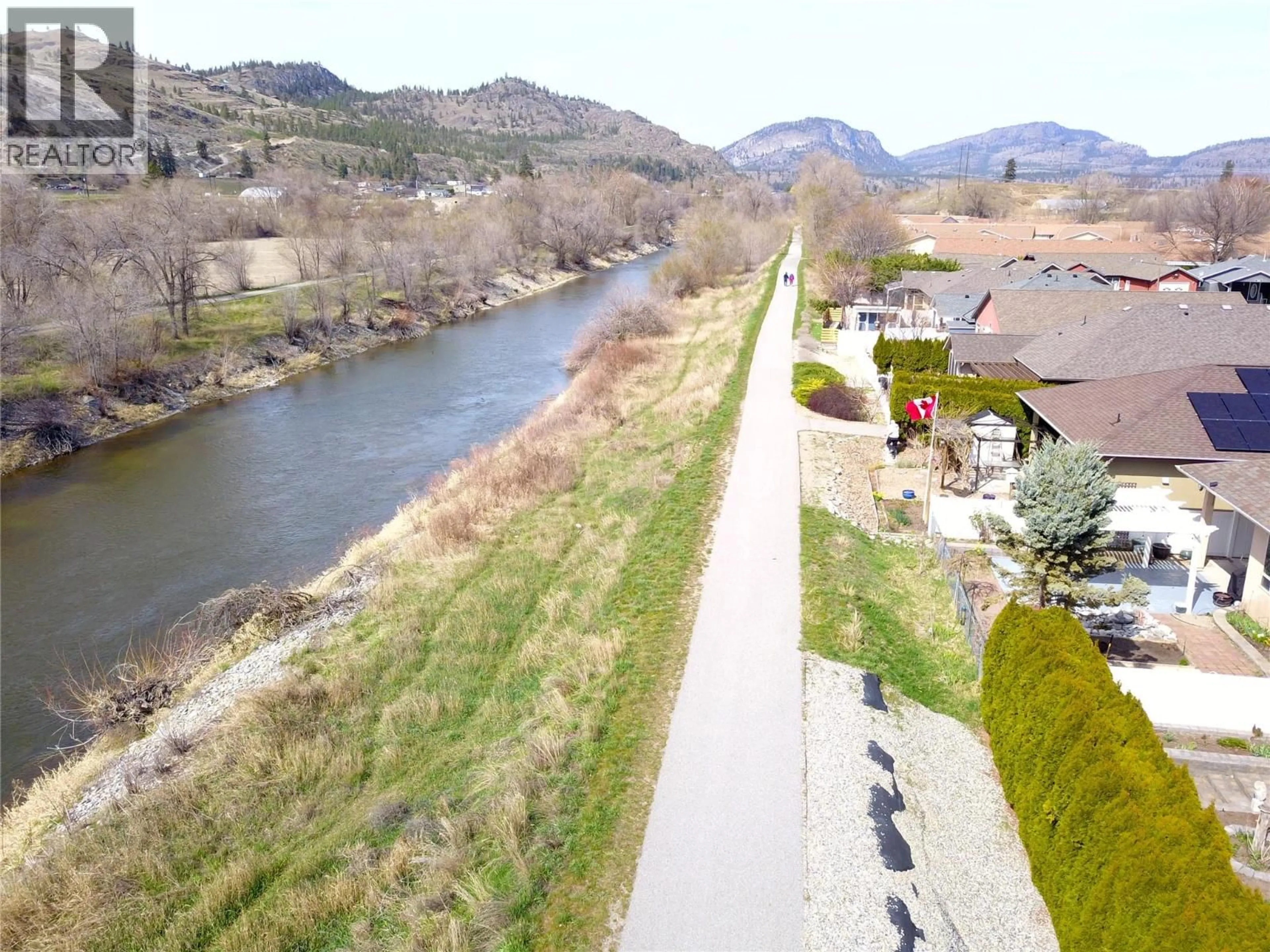 A pic from outside/outdoor area/front of a property/back of a property/a pic from drone, water/lake/river/ocean view for 162 WILLOWS PLACE, Oliver British Columbia V0H1T4