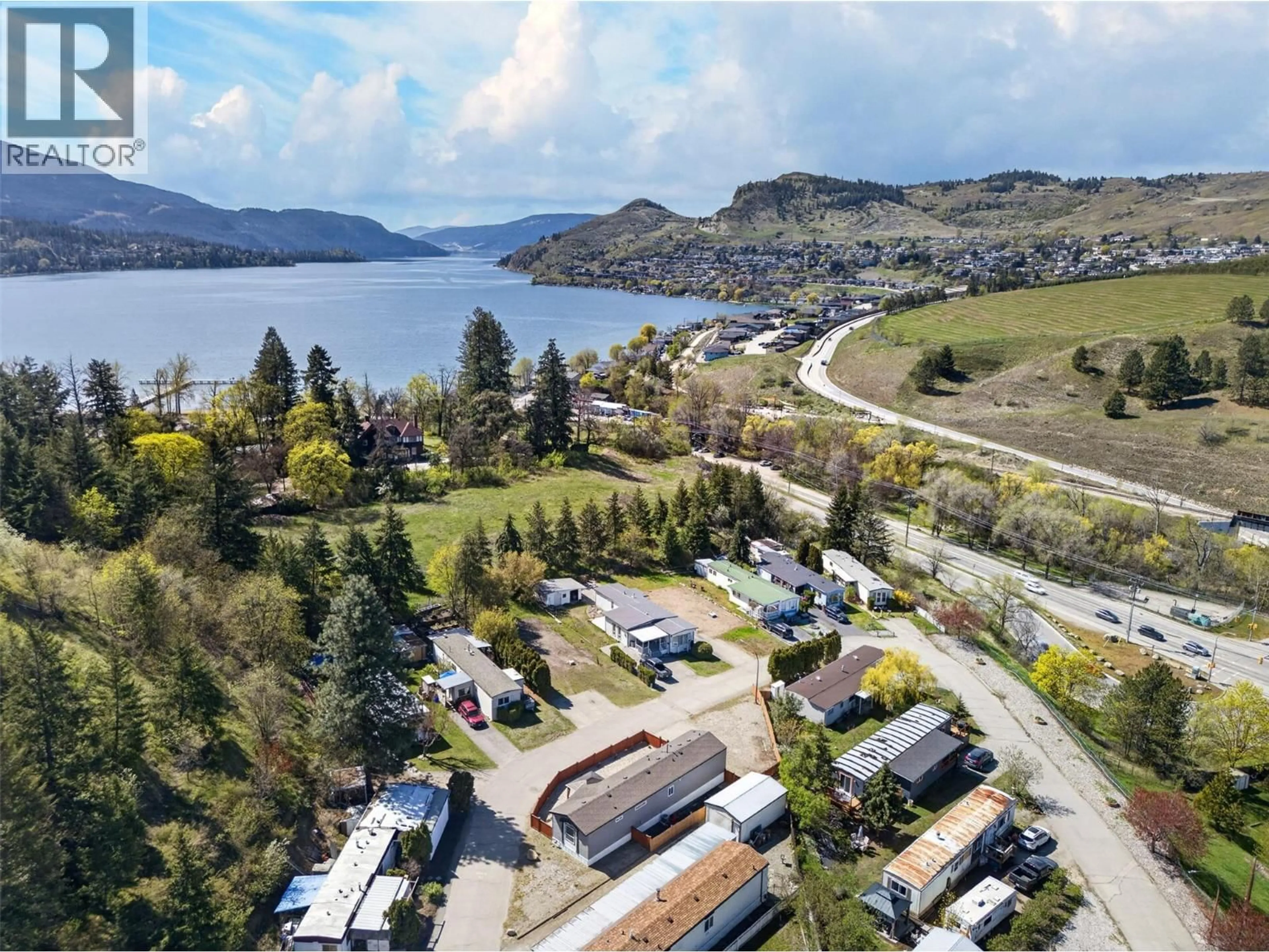 A pic from outside/outdoor area/front of a property/back of a property/a pic from drone, water/lake/river/ocean view for 172 - 15401 KALAMALKA ROAD, Coldstream British Columbia V1B2E3