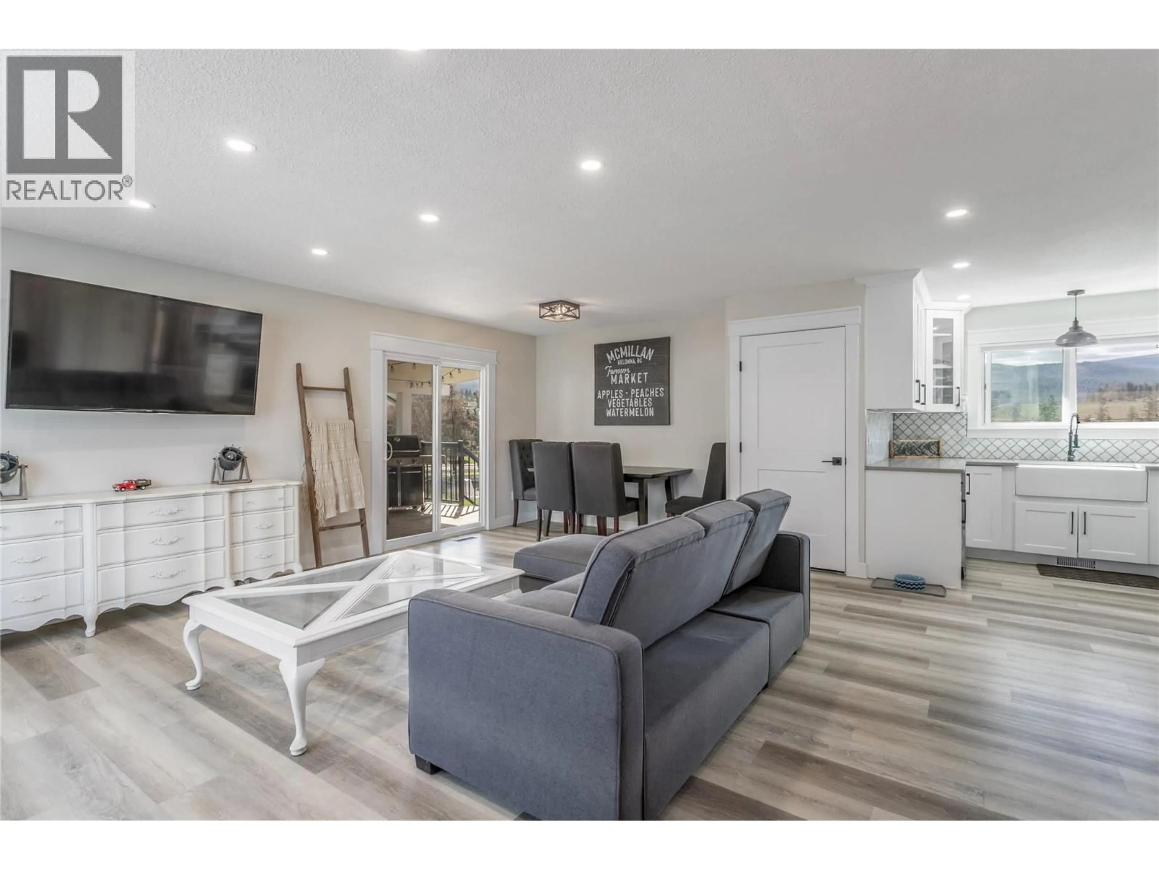 Living room with furniture, unknown for 1559 DUNCAN COURT, Kelowna British Columbia V1P1L2