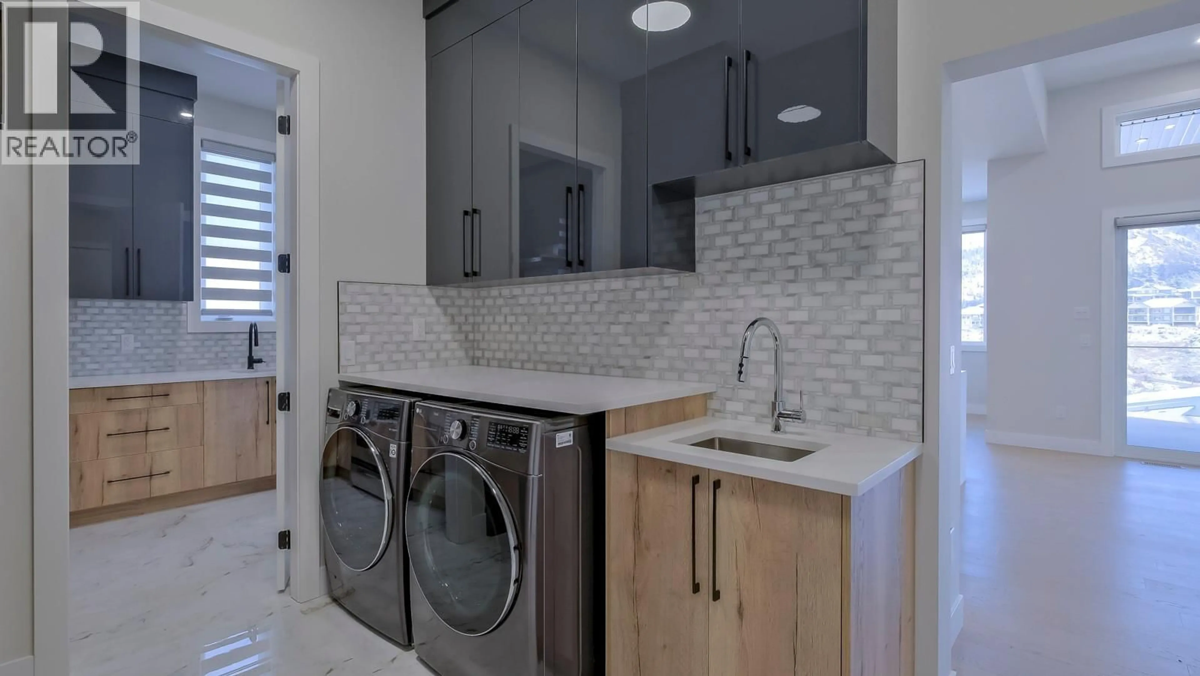 Laundry room for 937 ROYAL TROON LANE, Kelowna British Columbia V1P0A3