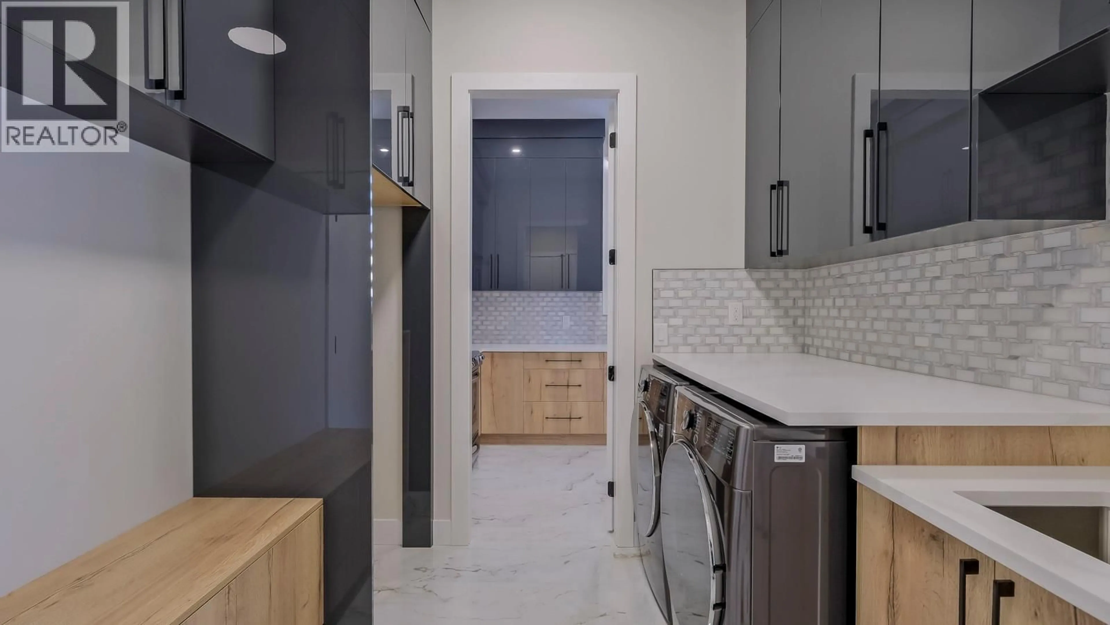 Laundry room for 937 ROYAL TROON LANE, Kelowna British Columbia V1P0A3