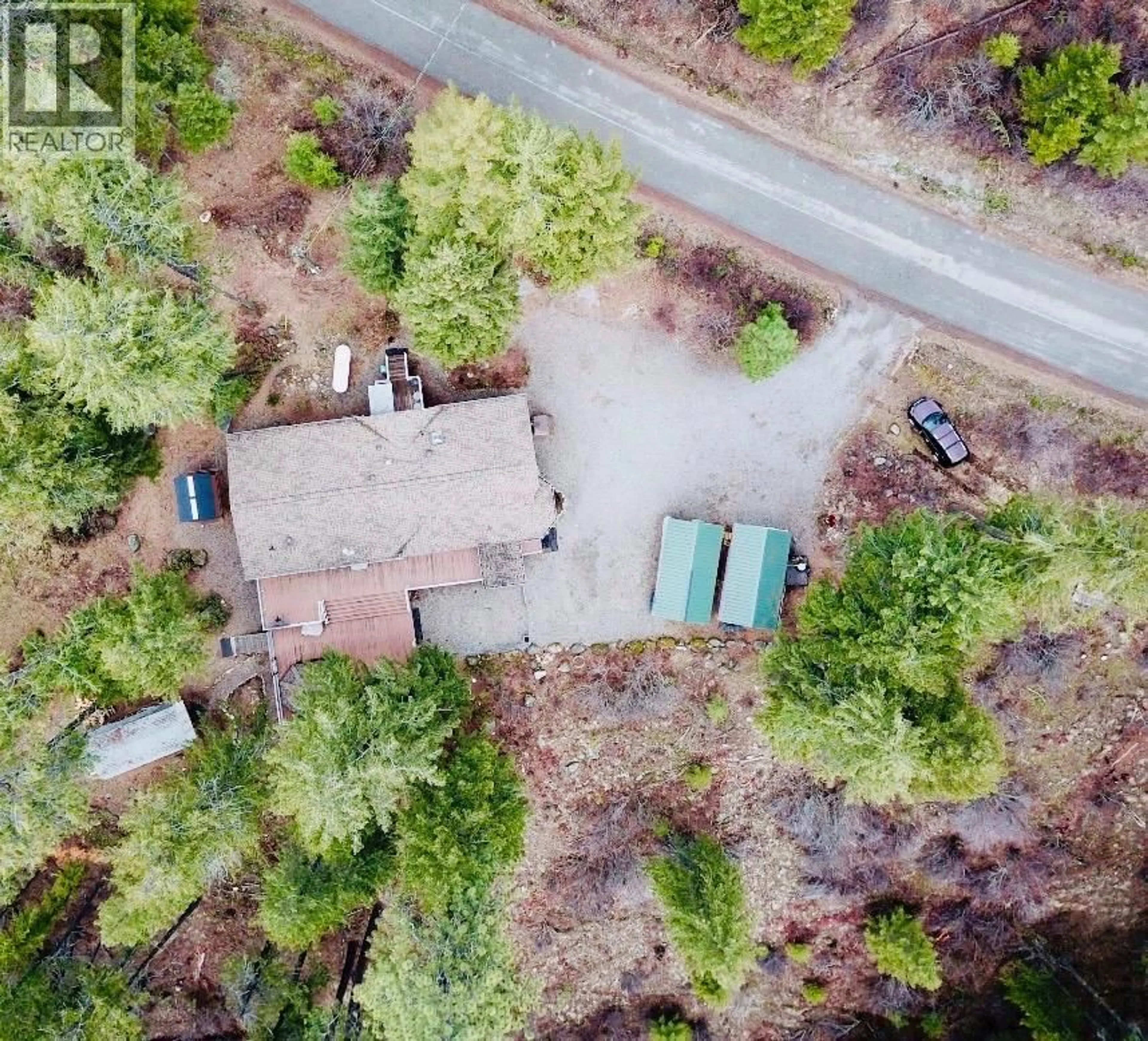 A pic from outside/outdoor area/front of a property/back of a property/a pic from drone, street for 7743 MCRAE ROAD, Christina Lake British Columbia V0H1E0