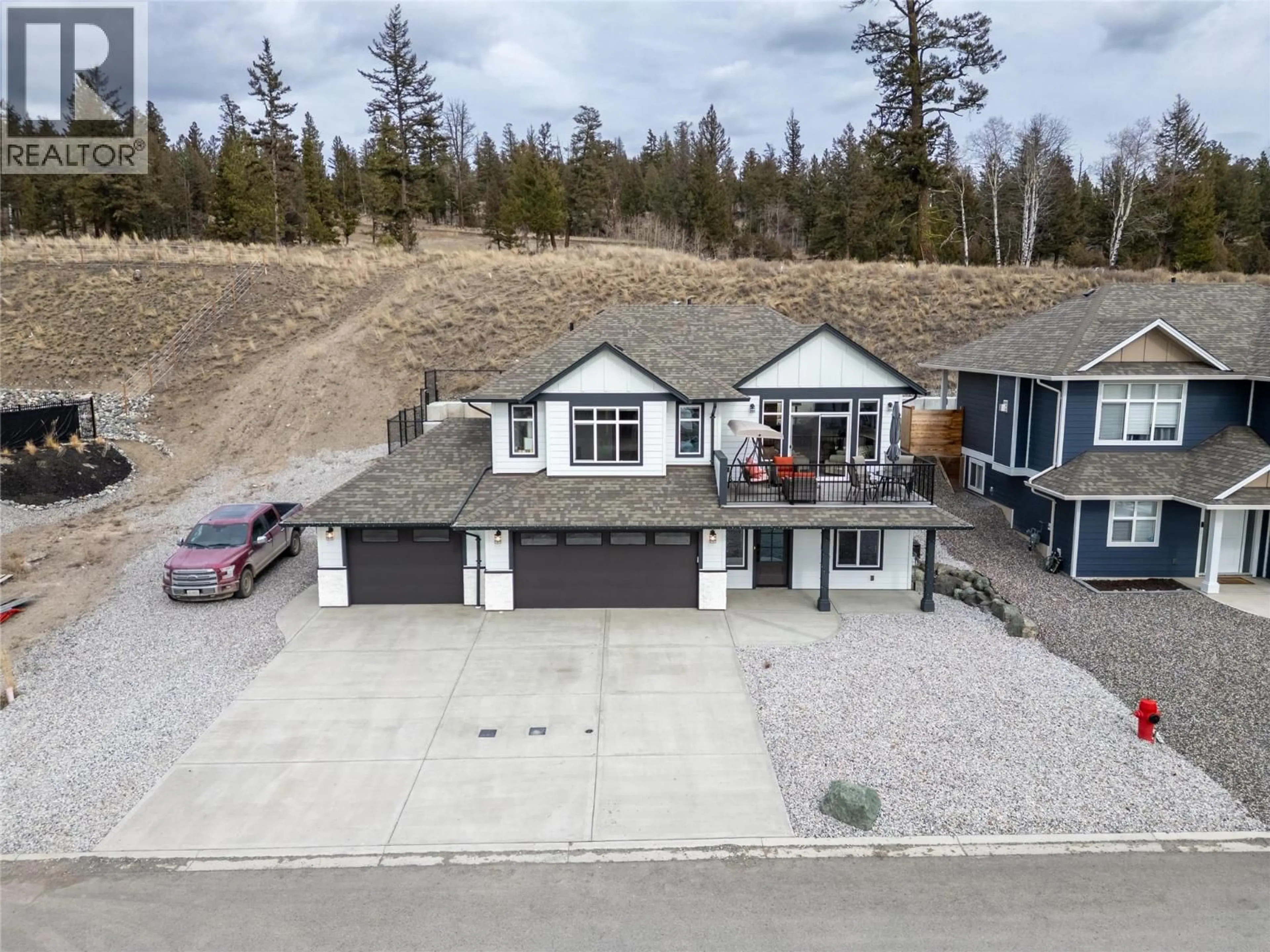 A pic from outside/outdoor area/front of a property/back of a property/a pic from drone, street for 503 POPLAR DRIVE, Logan Lake British Columbia V0K1W0