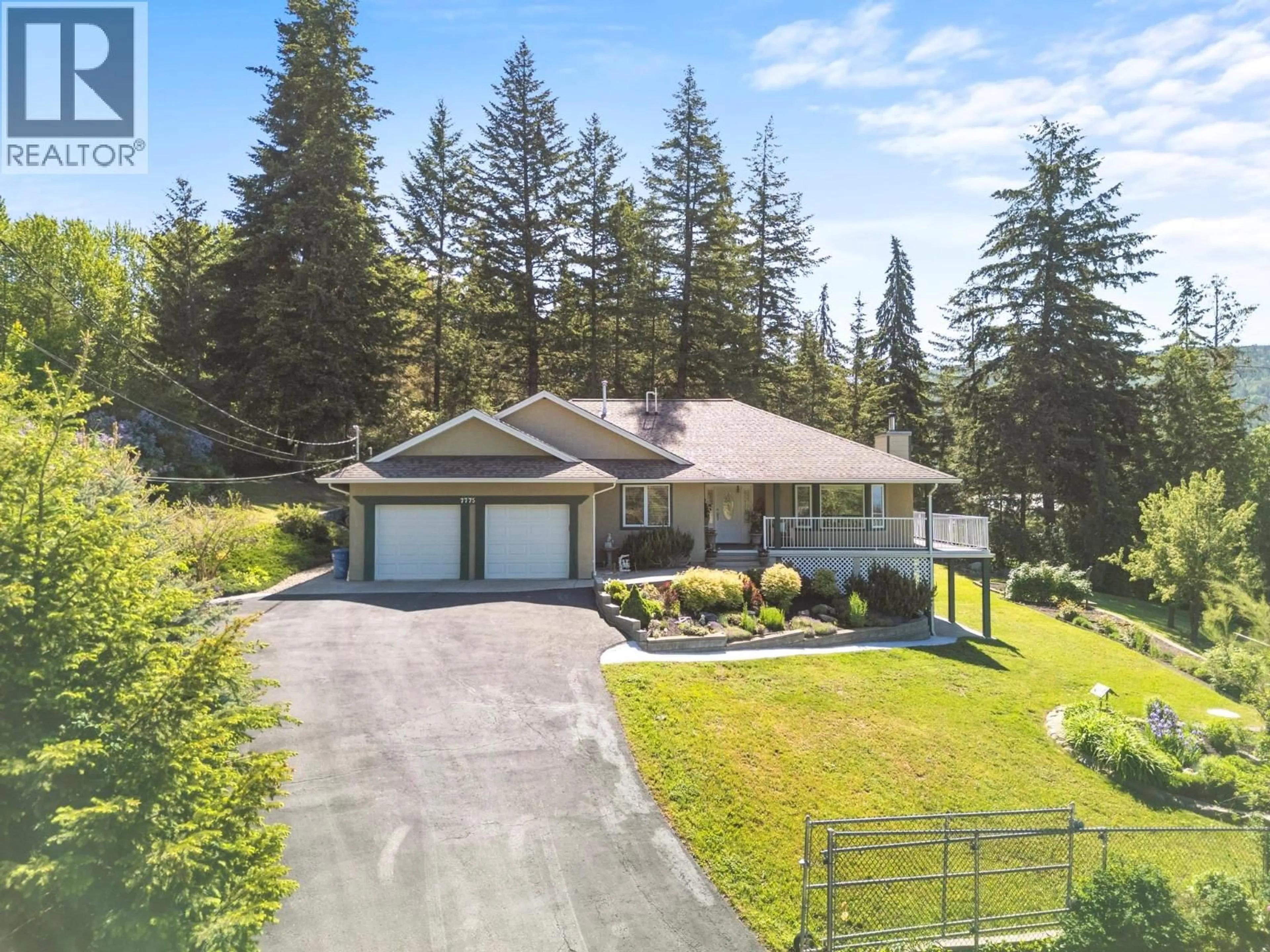 A pic from outside/outdoor area/front of a property/back of a property/a pic from drone, unknown for 7775 CHEW ROAD, Vernon British Columbia V1B3N6