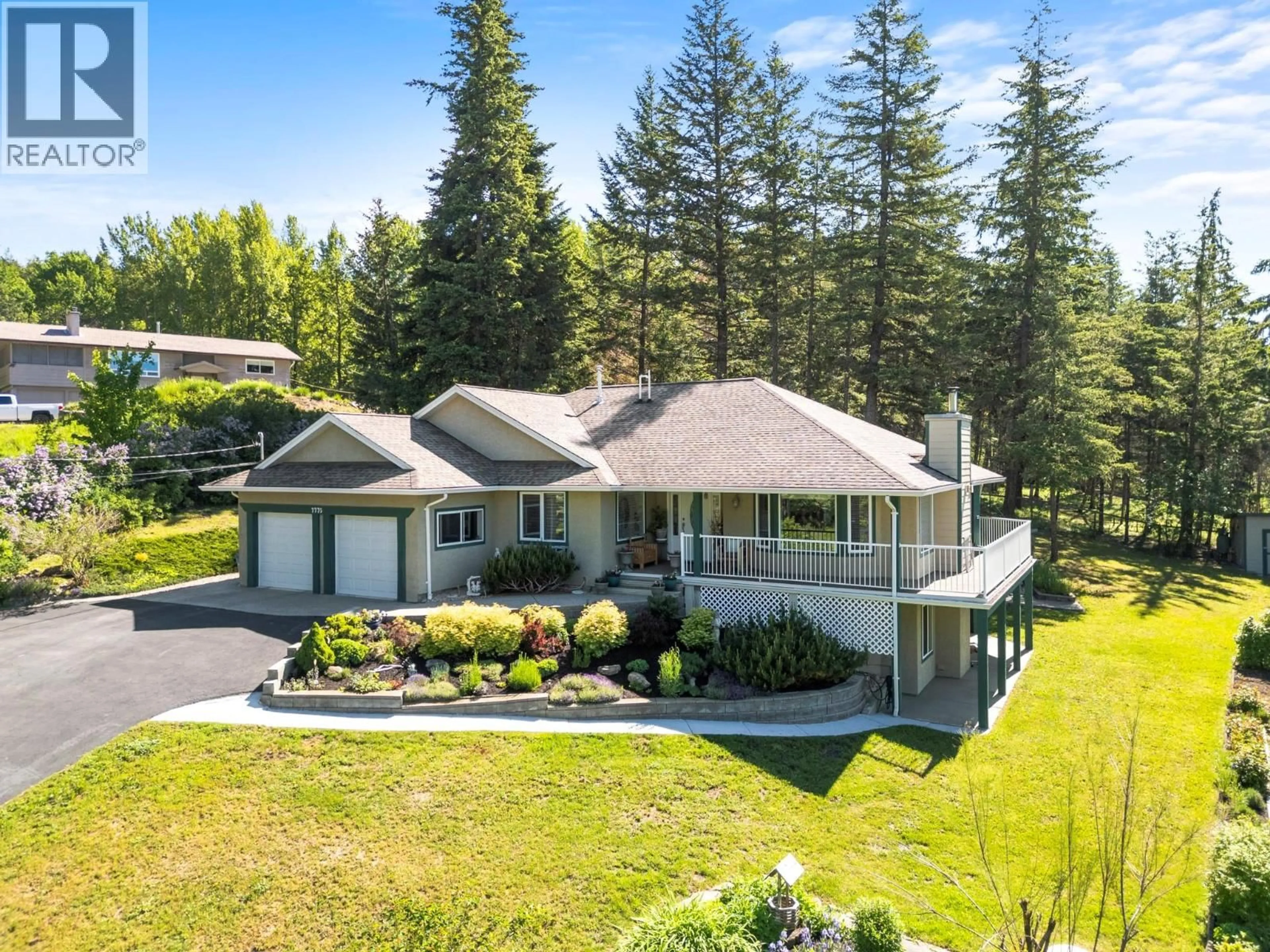 A pic from outside/outdoor area/front of a property/back of a property/a pic from drone, mountain view for 7775 CHEW ROAD, Vernon British Columbia V1B3N6