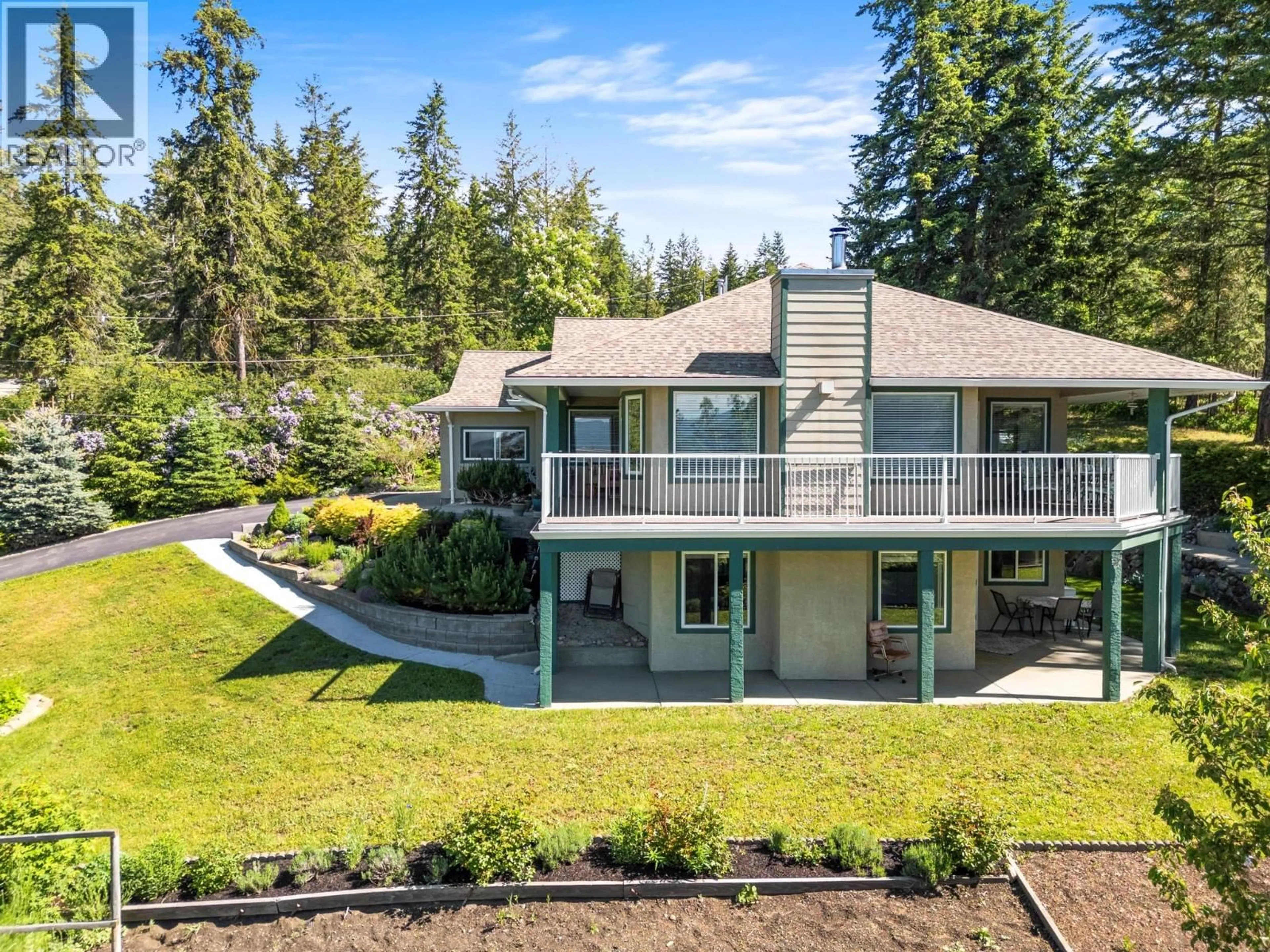 A pic from outside/outdoor area/front of a property/back of a property/a pic from drone, unknown for 7775 CHEW ROAD, Vernon British Columbia V1B3N6