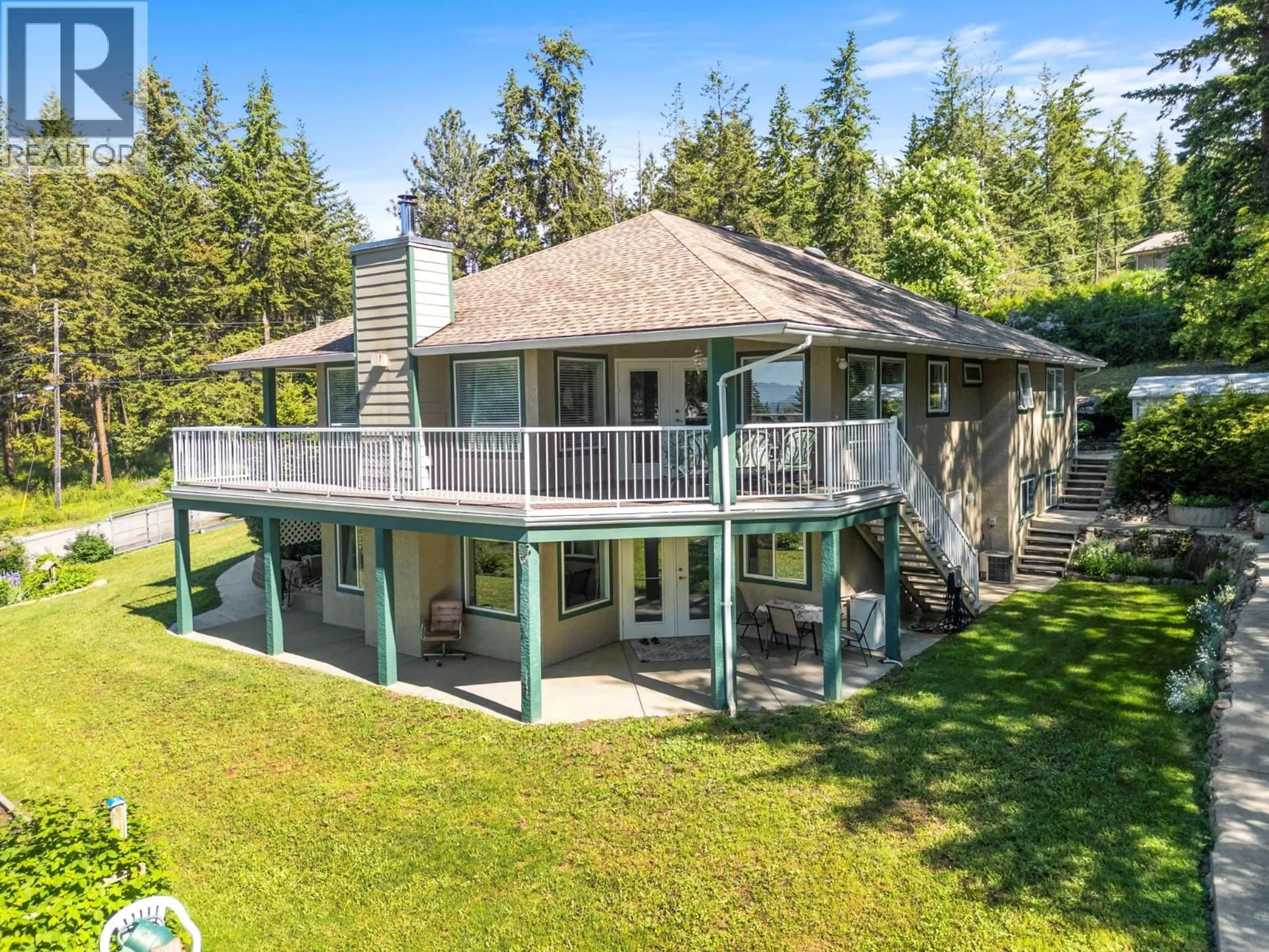 A pic from outside/outdoor area/front of a property/back of a property/a pic from drone, water/lake/river/ocean view for 7775 CHEW ROAD, Vernon British Columbia V1B3N6