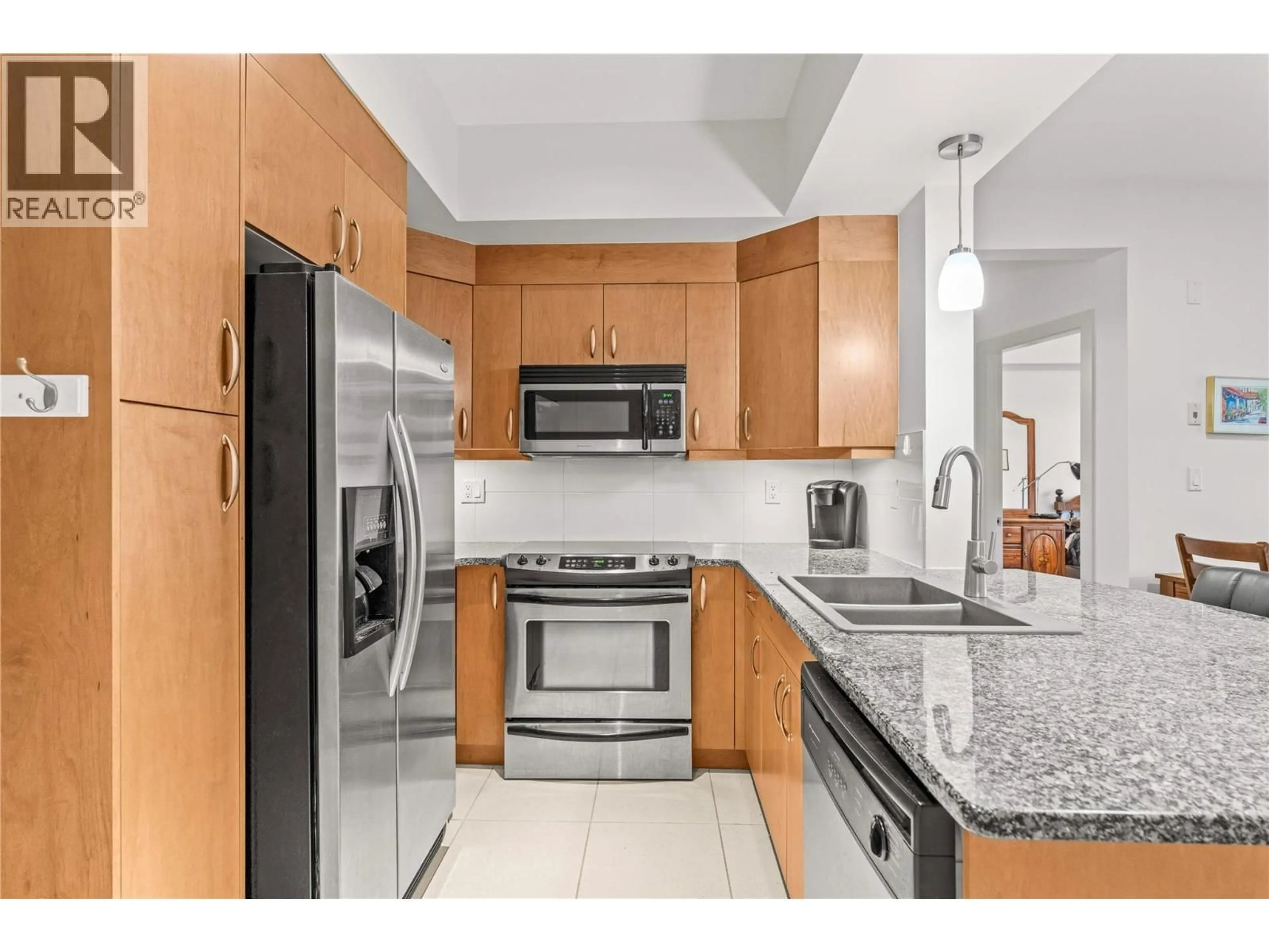 Standard kitchen, ceramic/tile floor for 1112 - 7343 OKANAGAN LANDING ROAD, Vernon British Columbia V1H2J6