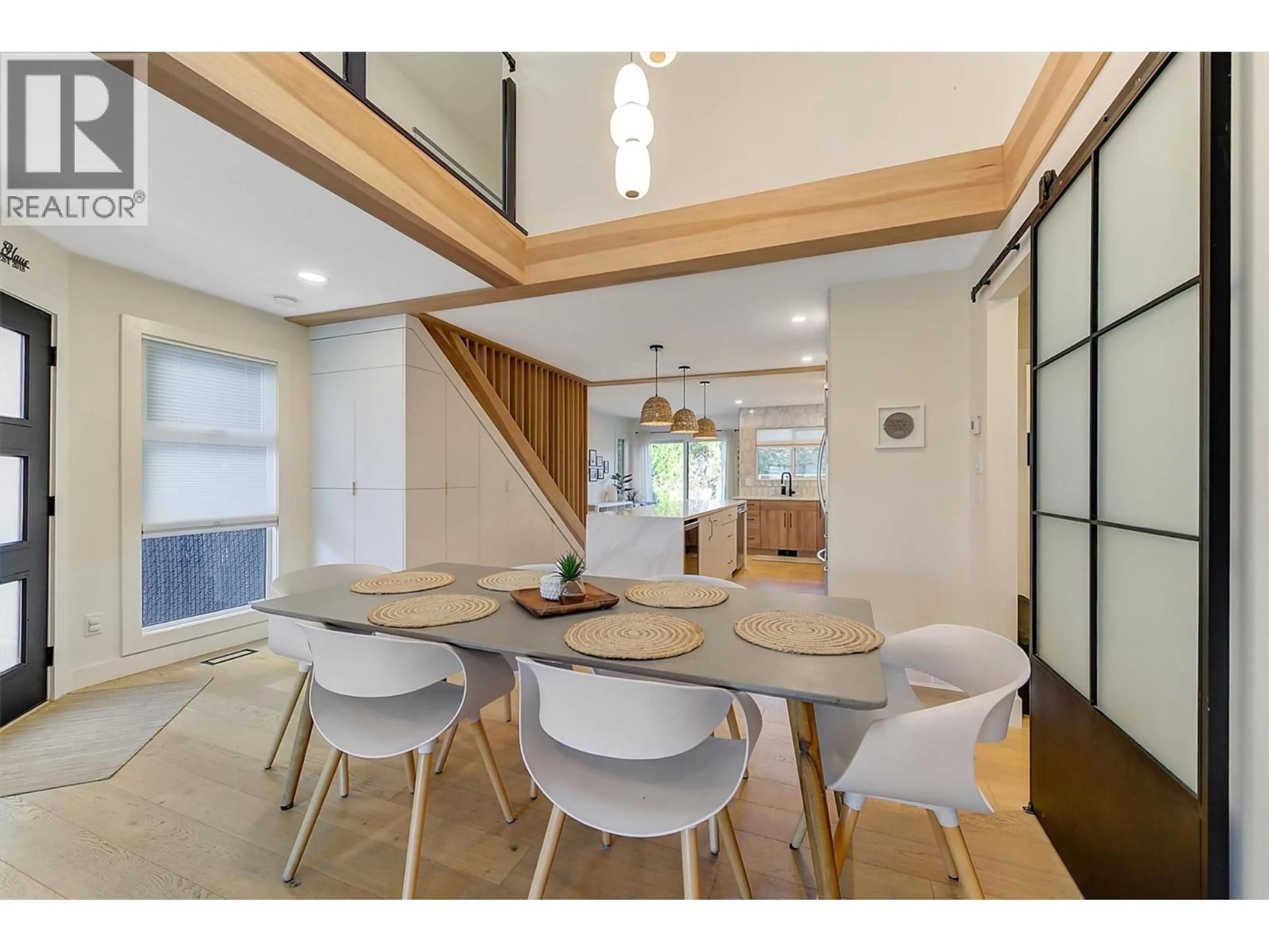 Dining room, wood/laminate floor for 985 MANHATTAN DRIVE, Kelowna British Columbia V1Y1H7