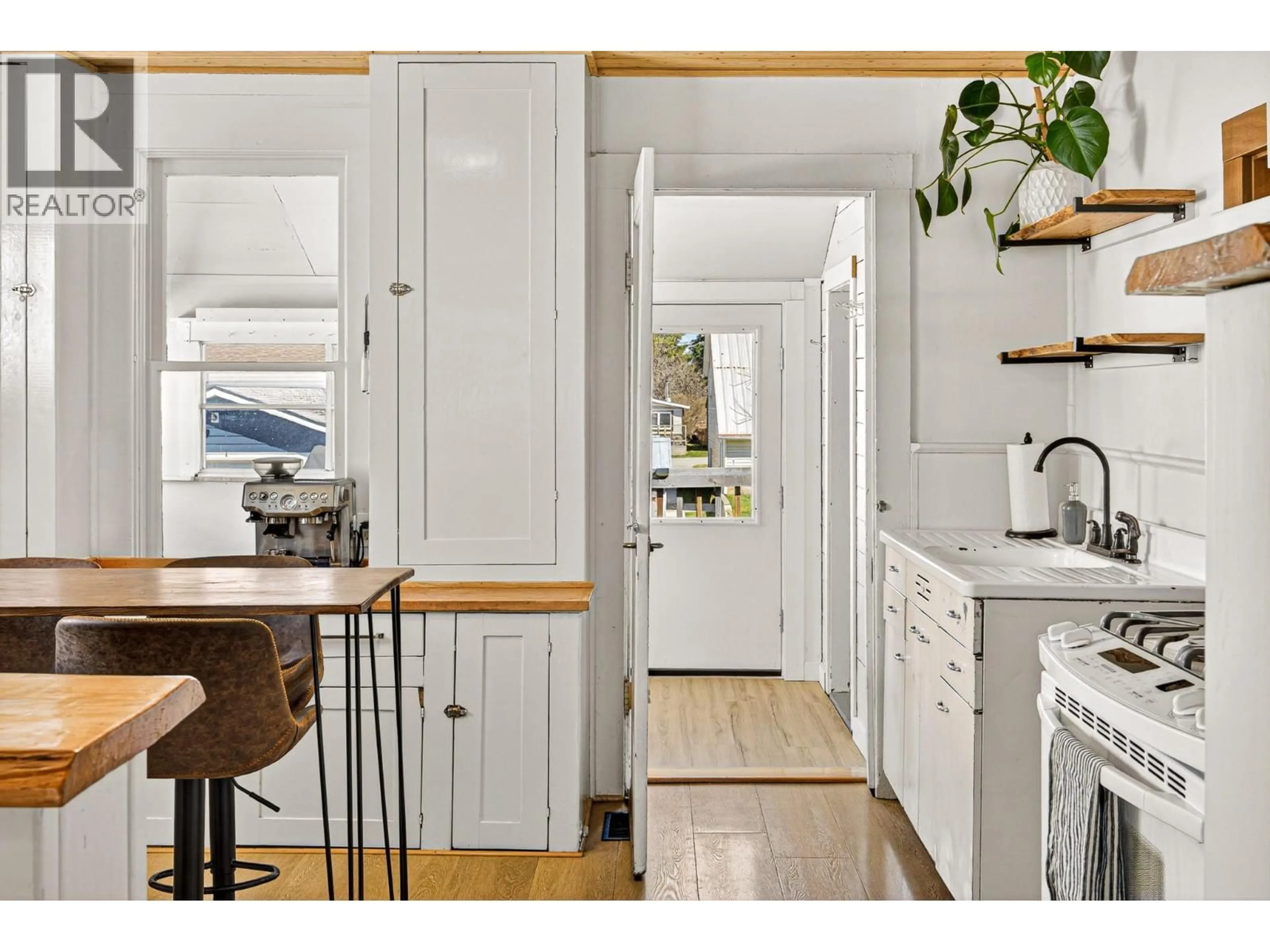 Open concept kitchen, wood/laminate floor for 146 14TH STREET, Fernie British Columbia V0B1M0