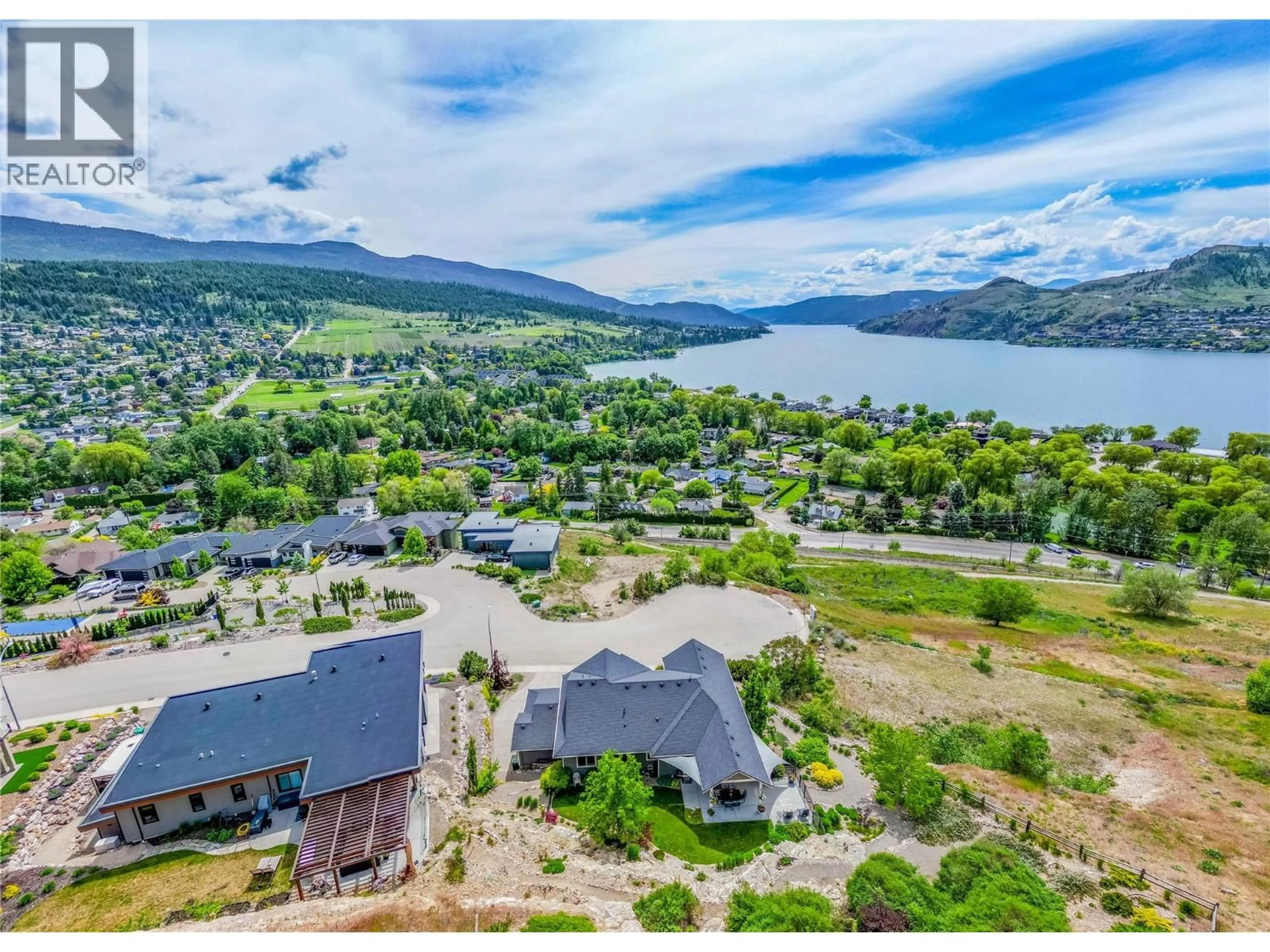 A pic from outside/outdoor area/front of a property/back of a property/a pic from drone, water/lake/river/ocean view for 8780 BRAEBURN DRIVE, Coldstream British Columbia V1B4E5