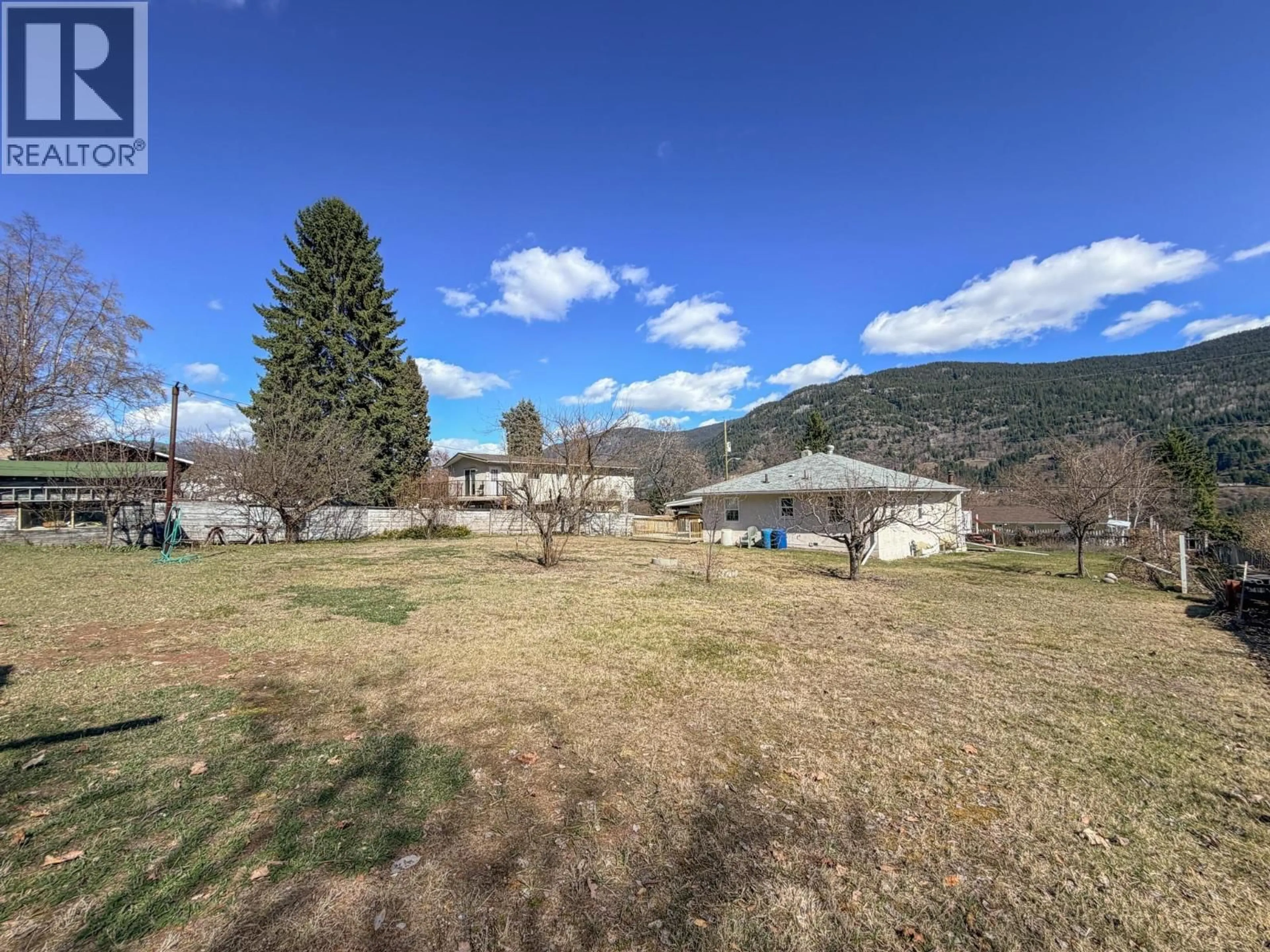 A pic from outside/outdoor area/front of a property/back of a property/a pic from drone, mountain view for 3404 4TH AVENUE, Castlegar British Columbia V1N2T3
