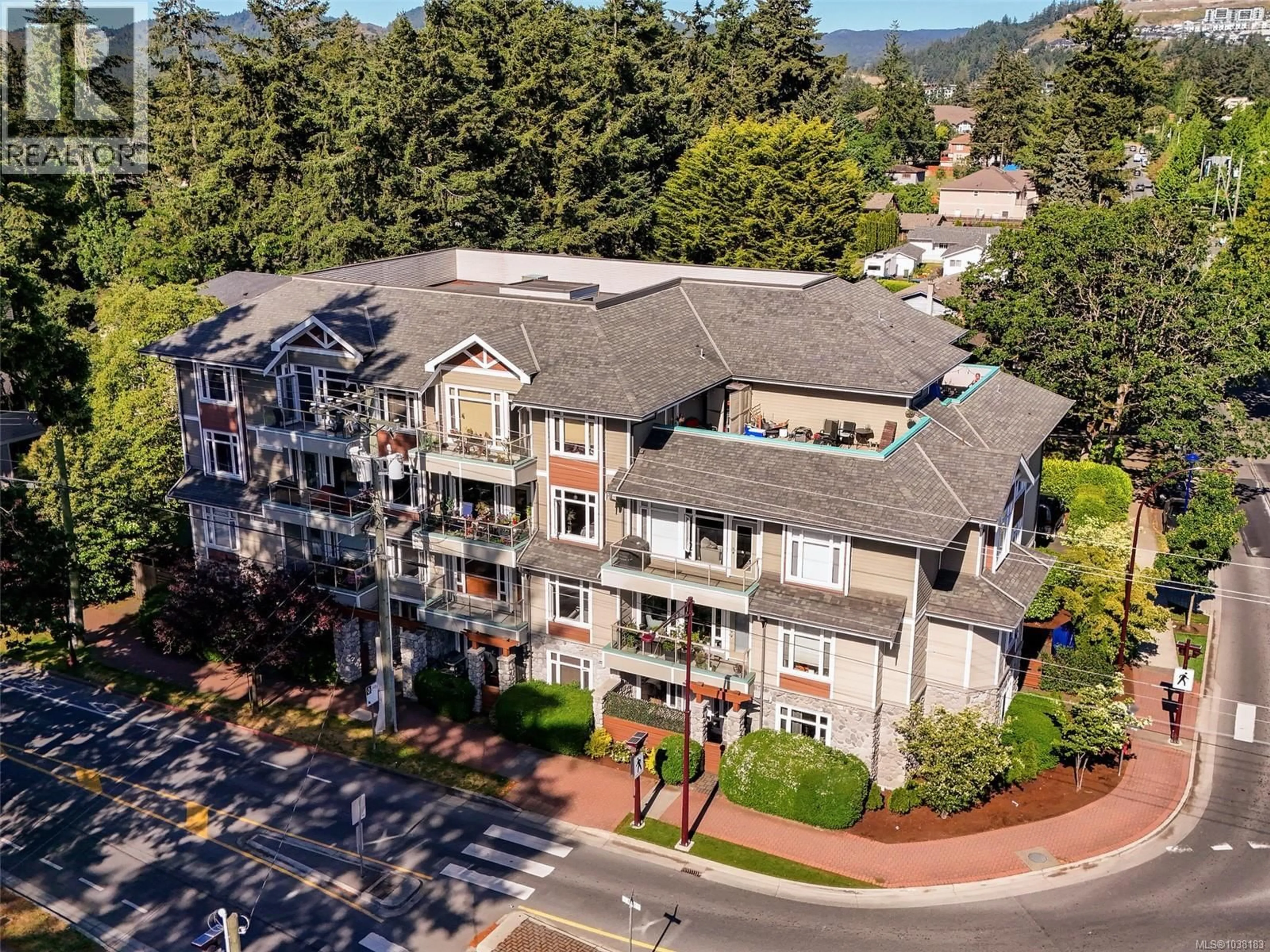 A pic from outside/outdoor area/front of a property/back of a property/a pic from drone, unknown for 203 - 2706 PEATT ROAD, Langford British Columbia V9B3V3