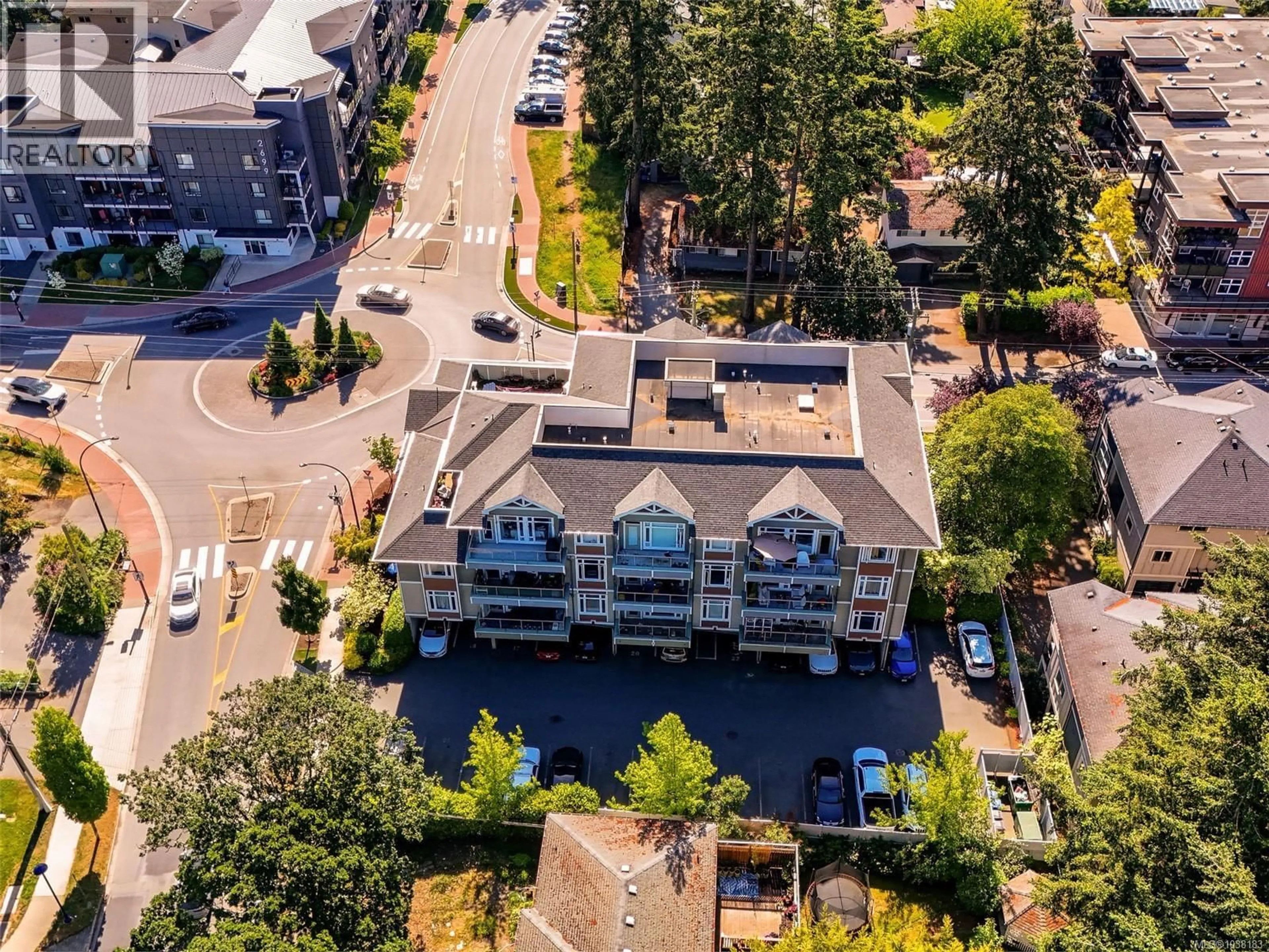 A pic from outside/outdoor area/front of a property/back of a property/a pic from drone, unknown for 203 - 2706 PEATT ROAD, Langford British Columbia V9B3V3