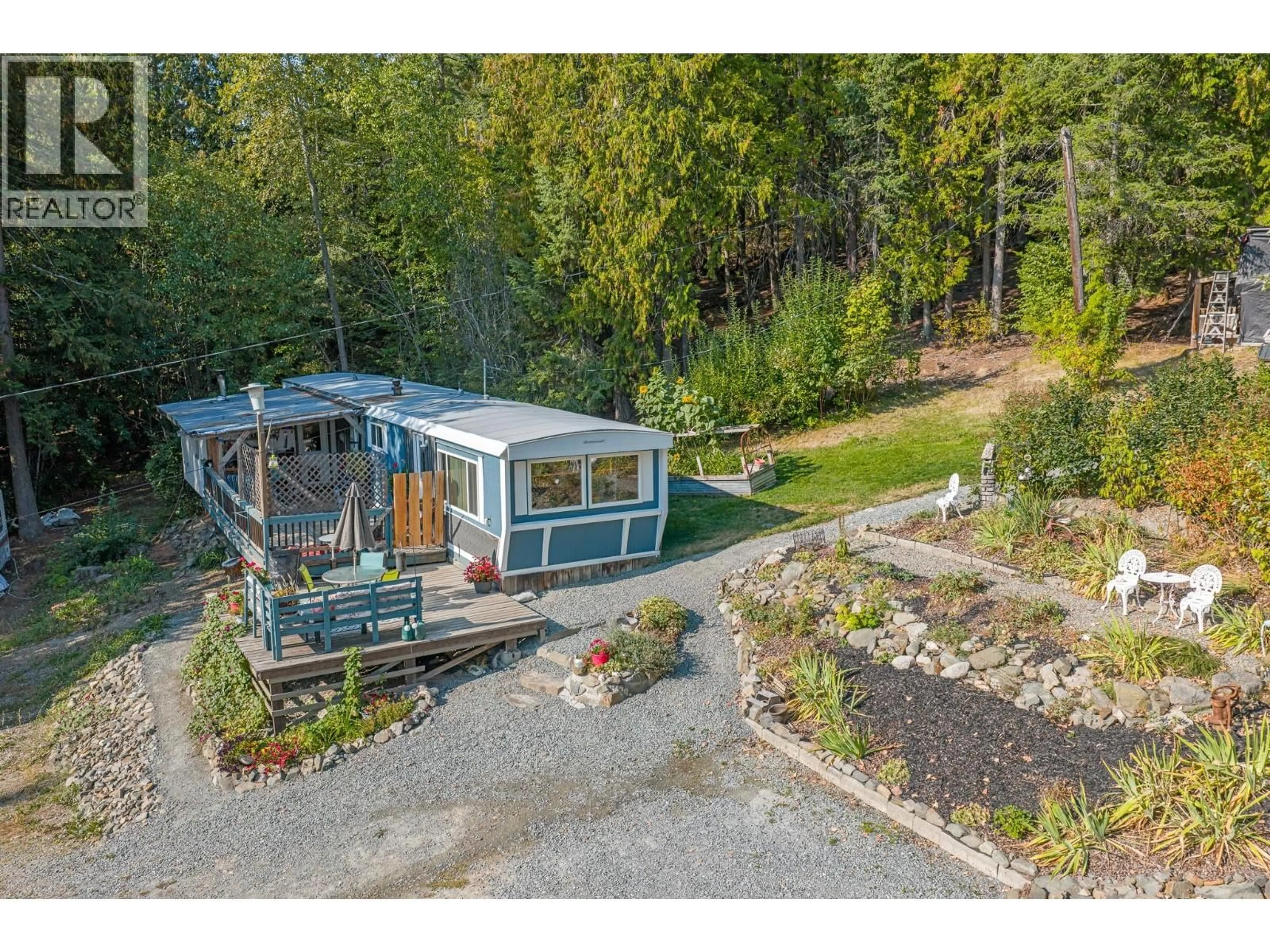 A pic from outside/outdoor area/front of a property/back of a property/a pic from drone, water/lake/river/ocean view for 1137 36TH AVENUE NORTH, Creston British Columbia V0B1G1