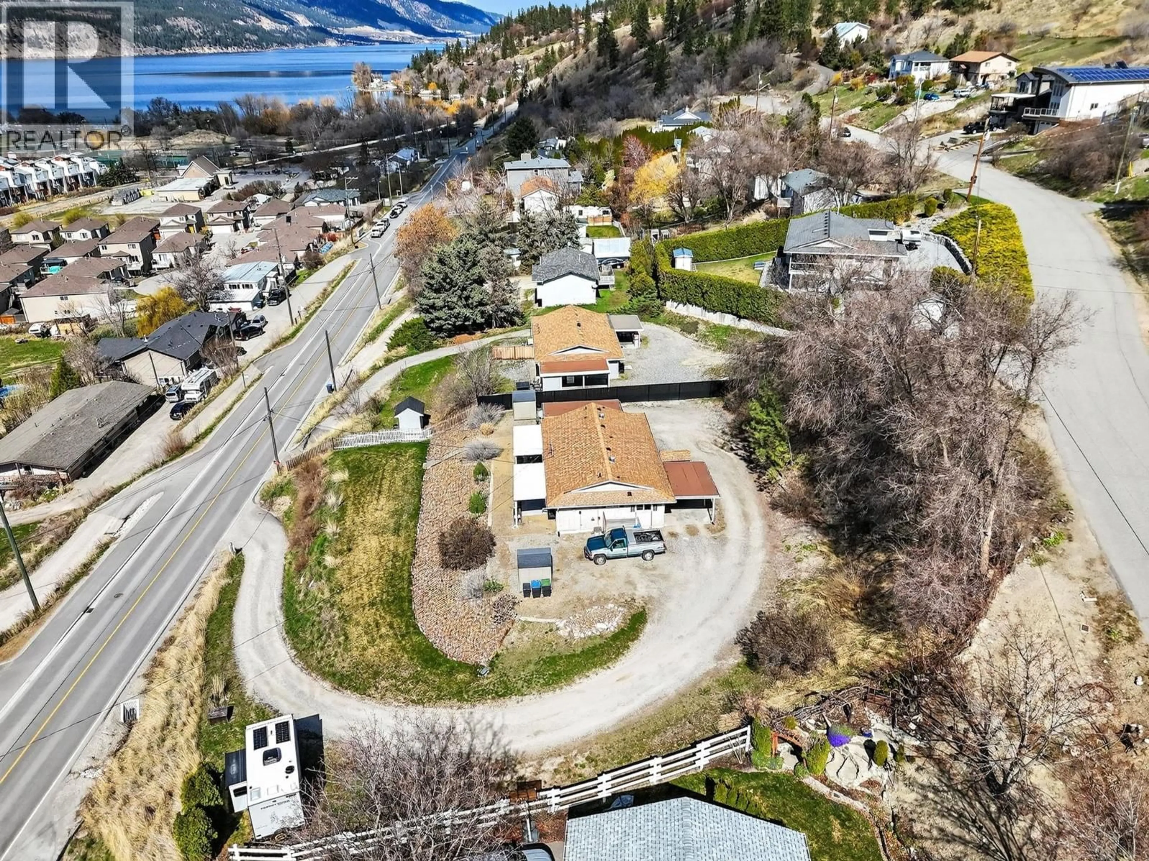 A pic from outside/outdoor area/front of a property/back of a property/a pic from drone, street for 11263 LODGE ROAD, Lake Country British Columbia V4V1Y2